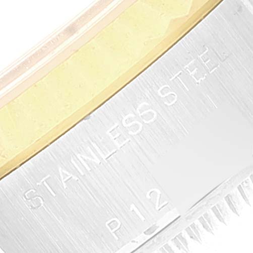 The image shows a macro shot of the stainless steel and gold parts of a Rolex Datejust 79173 Women's Steel and Gold (two tone) Champagne Dial 79173 Women's Steel and Gold (two tone) Champagne Dial watch.