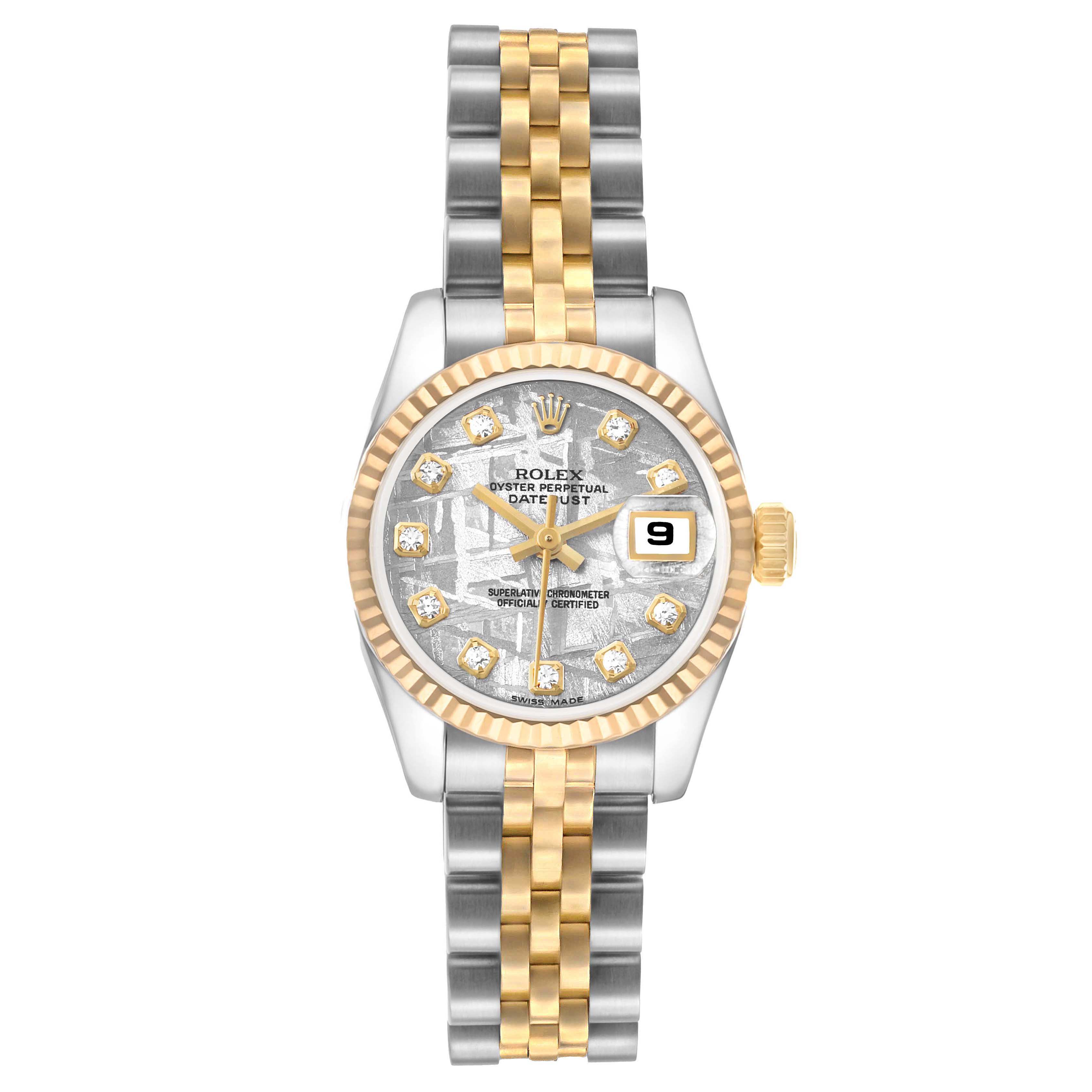 The Rolex Datejust 179173 Women
s Steel and Gold (two tone) Silver Dial watch is shown from the front, highlighting its two-tone jubilee bracelet, diamond markers, and fluted bezel.