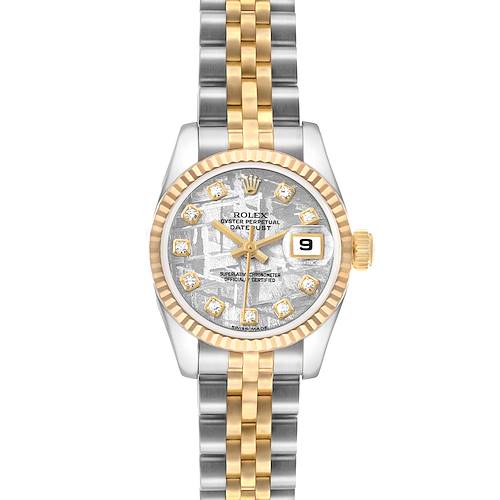 The Rolex Datejust 179173 Women's Steel and Gold (two tone) Silver Dial watch is shown from a top-down angle, highlighting its face, bezel, and two-tone bracelet.