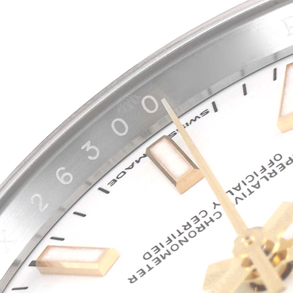 This close-up image shows the dial and bezel of a Rolex Datejust 126233 Men's Steel and Gold (two tone) White Dial 126233 Men's Steel and Gold (two tone) White Dial watch, highlighting the markers and the "Swiss Made" text.