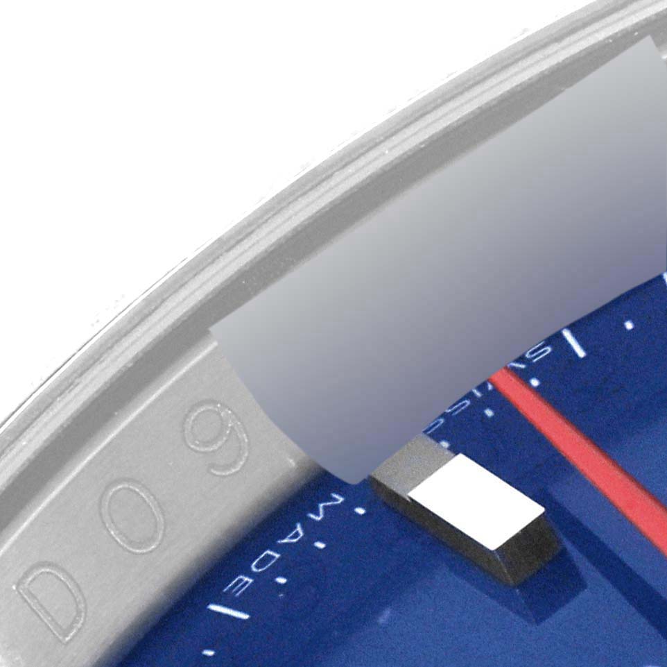 The image shows a close-up of the bezel and part of the dial of a Rolex Turn-o-Graph 116264 Men's Stainless Steel Blue Dial watch, highlighting the edge details.