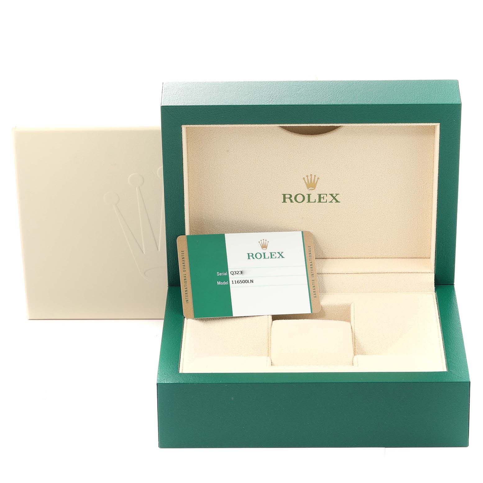 This image shows an open Rolex box for a Daytona model, displaying the watch card and inner compartments.