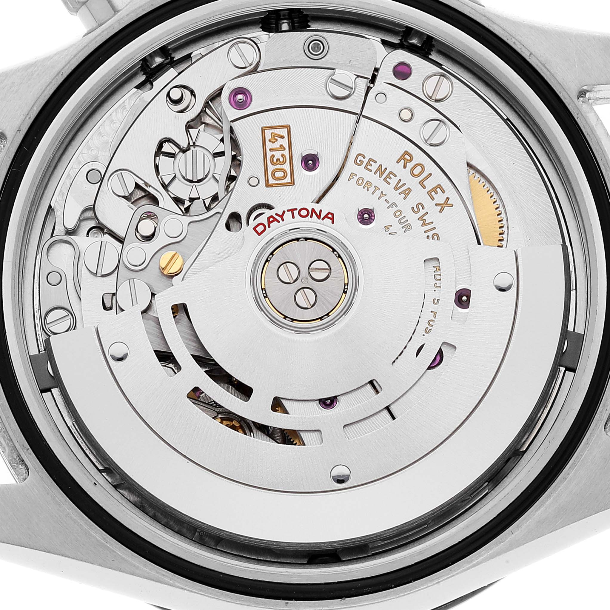 The image shows the internal mechanism of the Rolex Daytona 116500 Men's Stainless Steel Black Dial 116500 Men's Stainless Steel Black Dial watch, focusing on the movement and intricate parts.