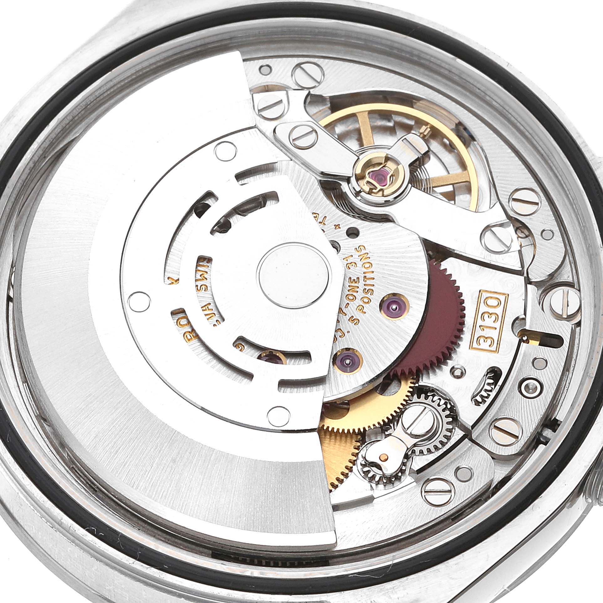 The image shows the movement of a Rolex Explorer 114270 Men's Stainless Steel Black Dial watch, highlighting gears, screws, and the balance wheel from a top-down angle.