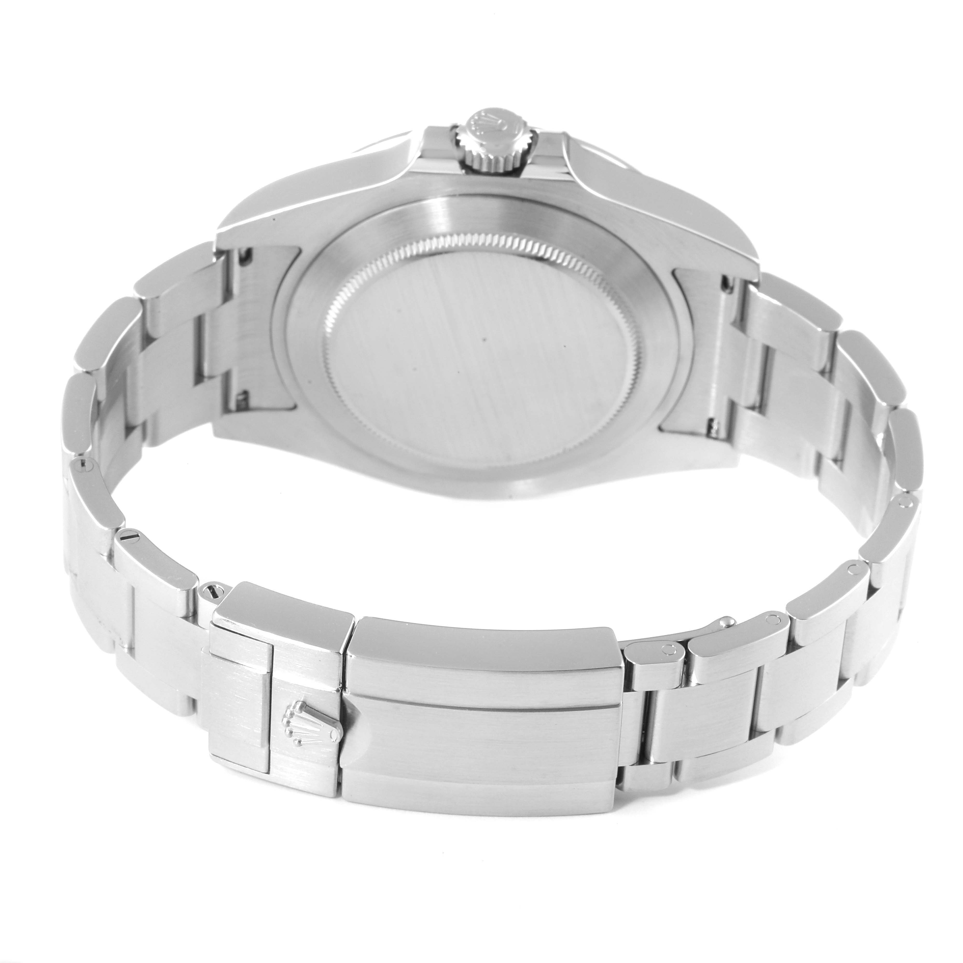 The image shows the backside of the Rolex Explorer 216570 Men's Stainless Steel White Dial 216570 Men's Stainless Steel White Dial watch, highlighting its case back, bracelet, and clasp.