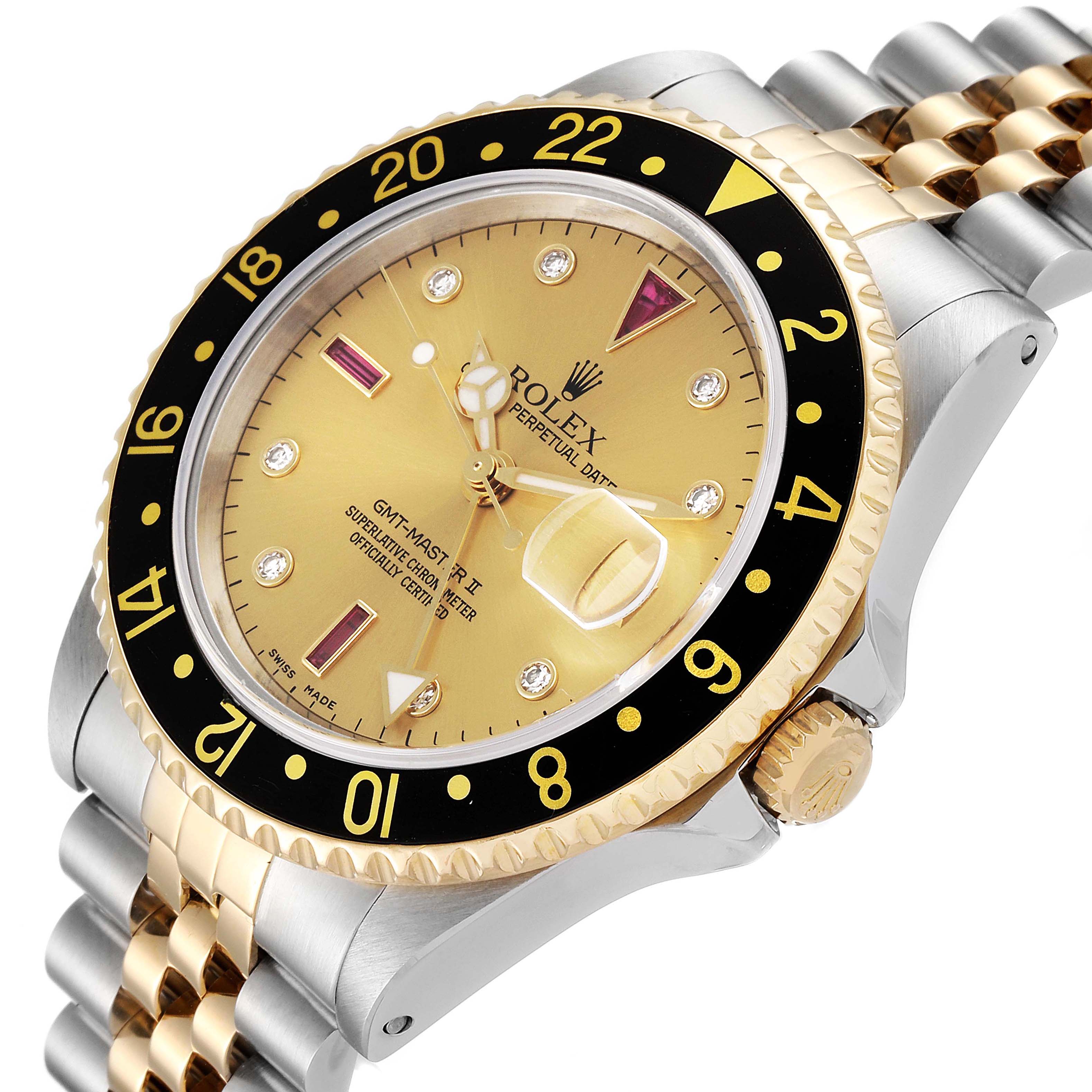 The image shows a Rolex GMT-Master 16713 Men's Steel and Gold (two tone) Champagne Dial 16713 Men's Steel and Gold (two tone) Champagne Dial II watch at an angled view, highlighting the gold dial, bezel, and two-tone bracelet.