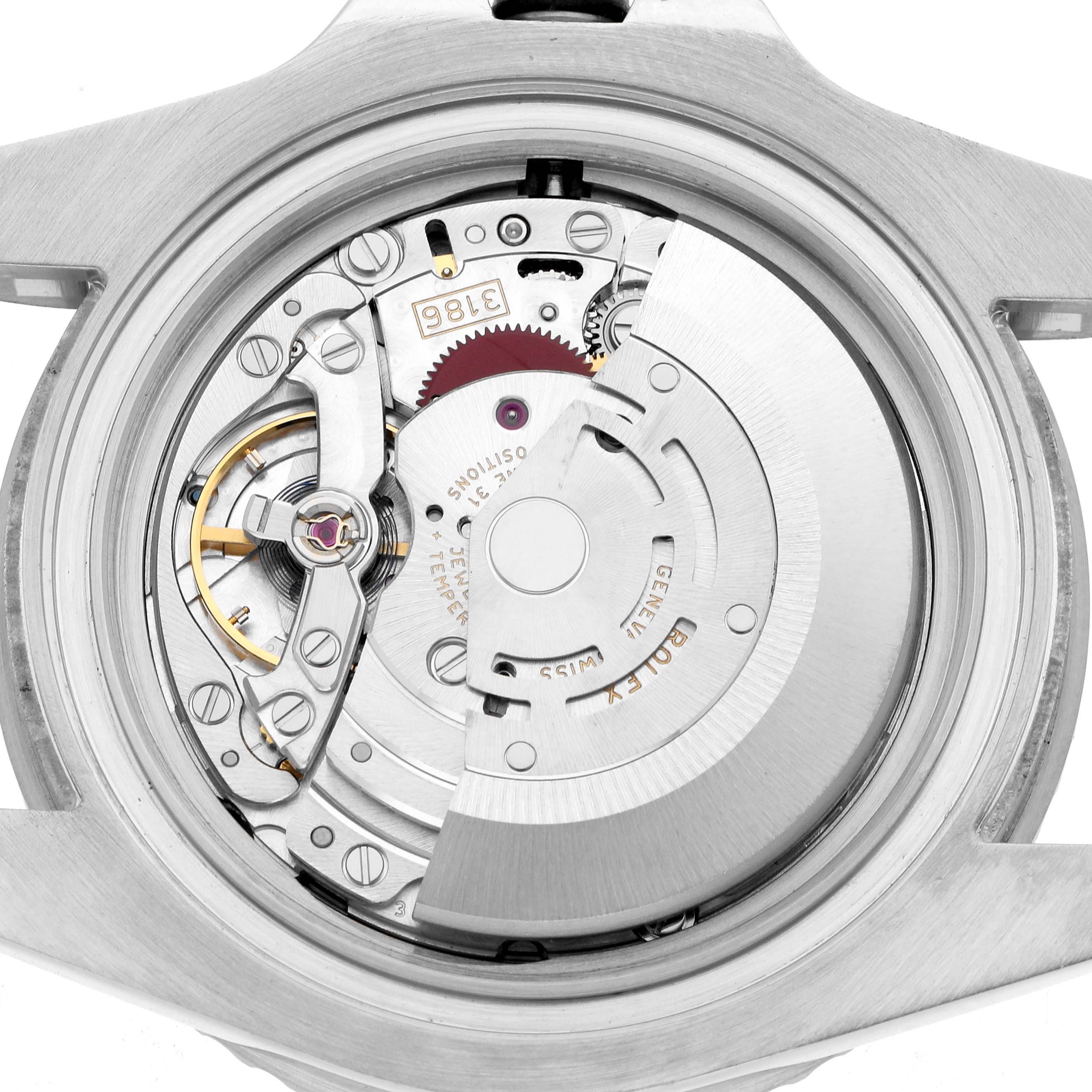 The image shows a close-up of the movement and internal mechanism of a Rolex GMT-Master 116710LN Men's Stainless Steel Black Dial watch from the back.