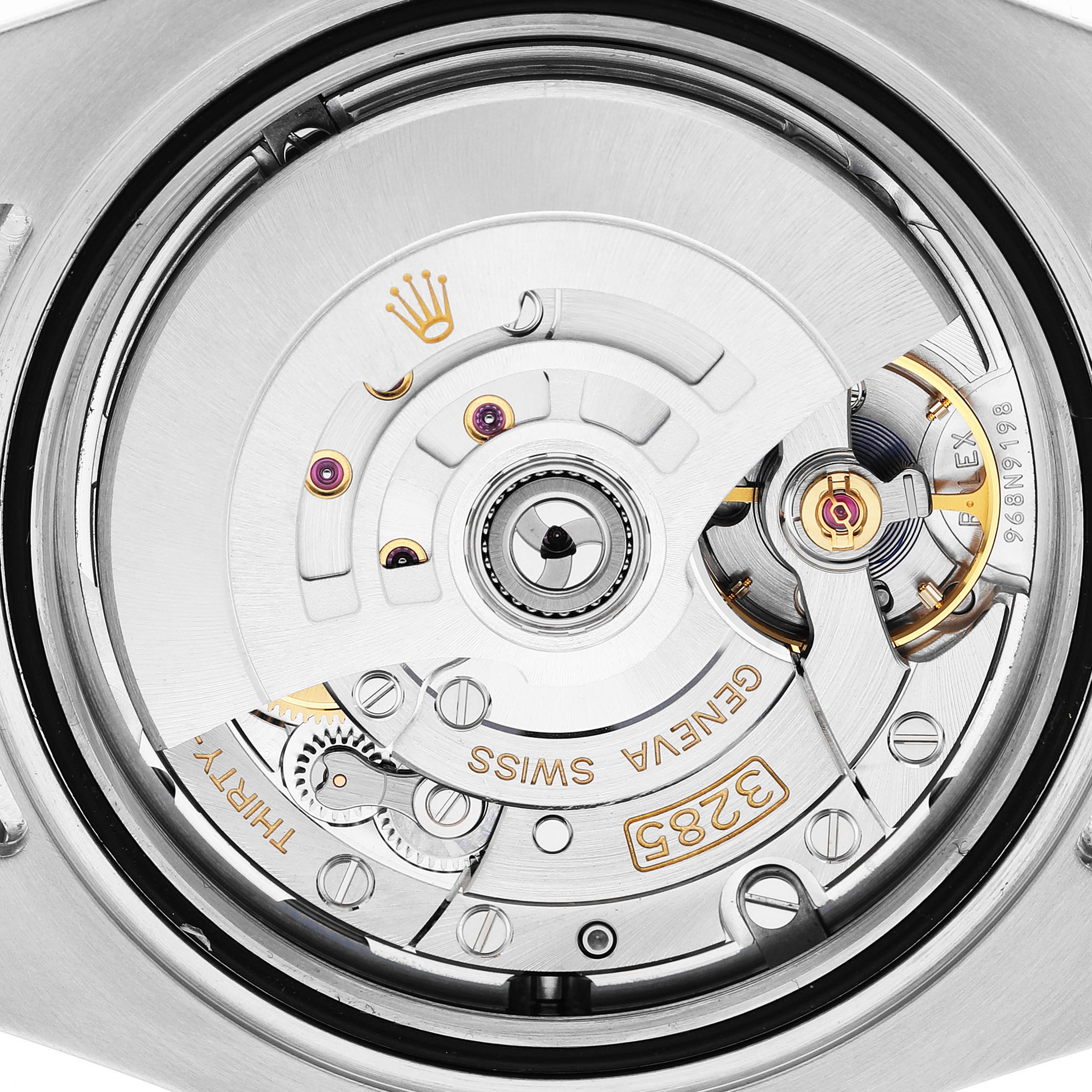 The image shows the movement of a Rolex GMT-Master 126710BLRO Men's Stainless Steel Black Dial, highlighting the caliber 3285 mechanism with engravings.