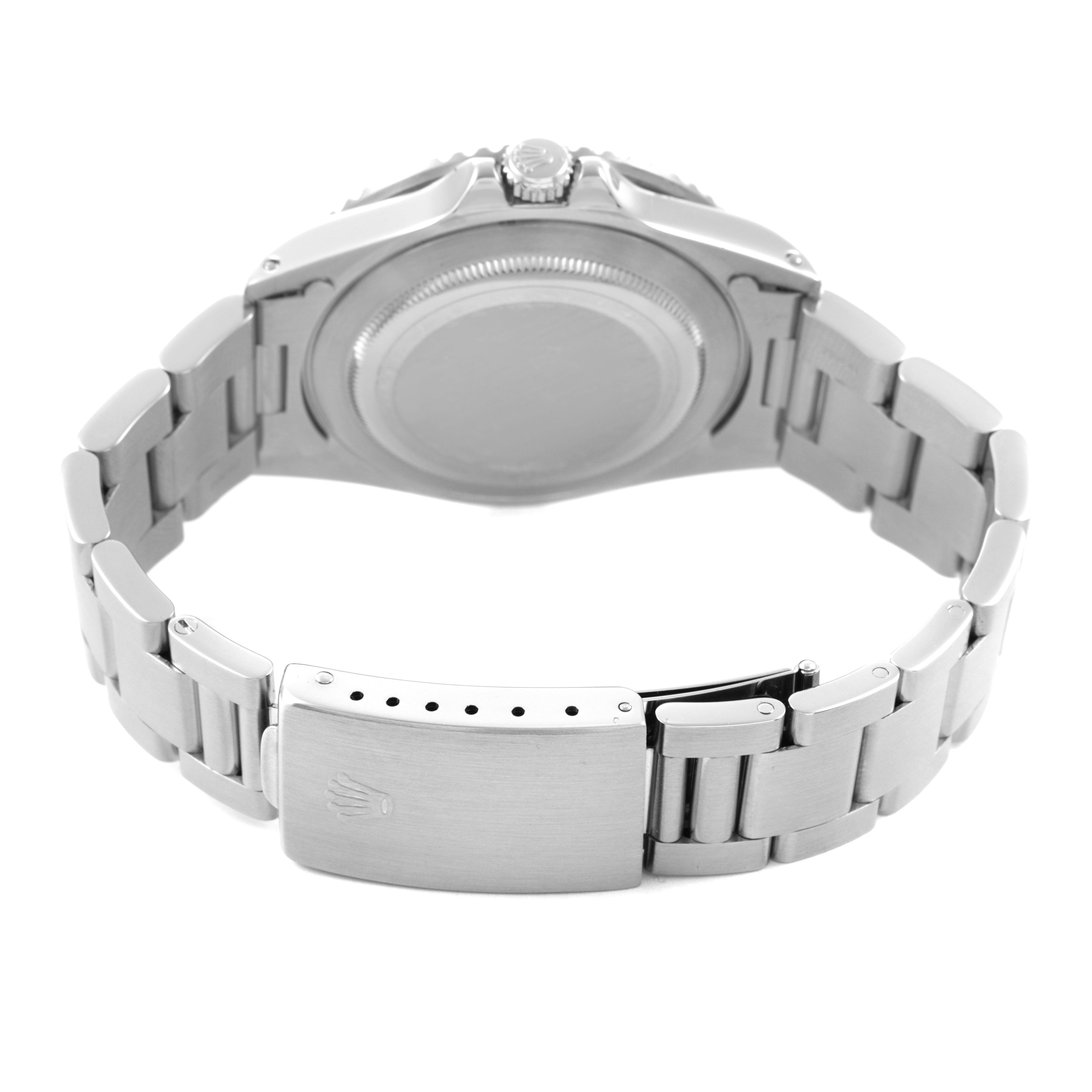 The image shows the back view of a Rolex GMT-Master 16700 Men's Stainless Steel Black Dial, highlighting the case back, bracelet, and clasp.
