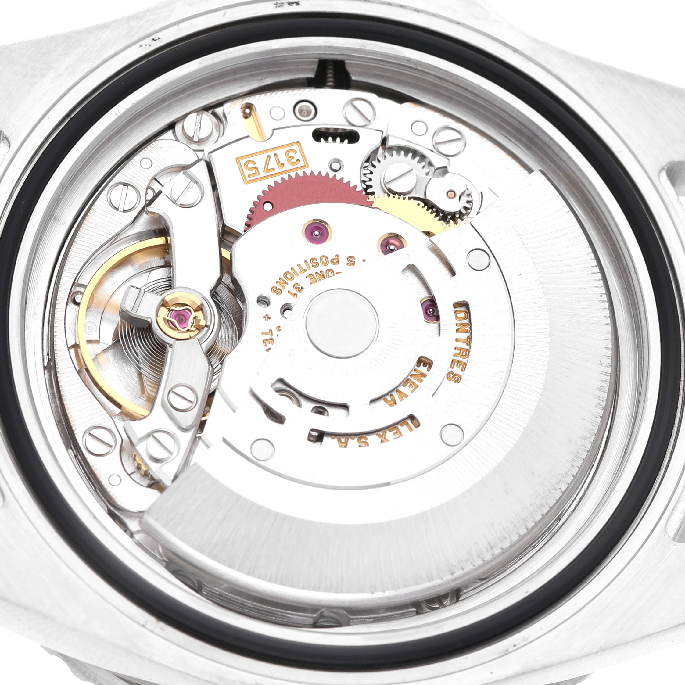 This image shows the internal mechanism of a Rolex GMT-Master 16700 Men's Stainless Steel Black Dial watch, featuring its intricate gears and components.