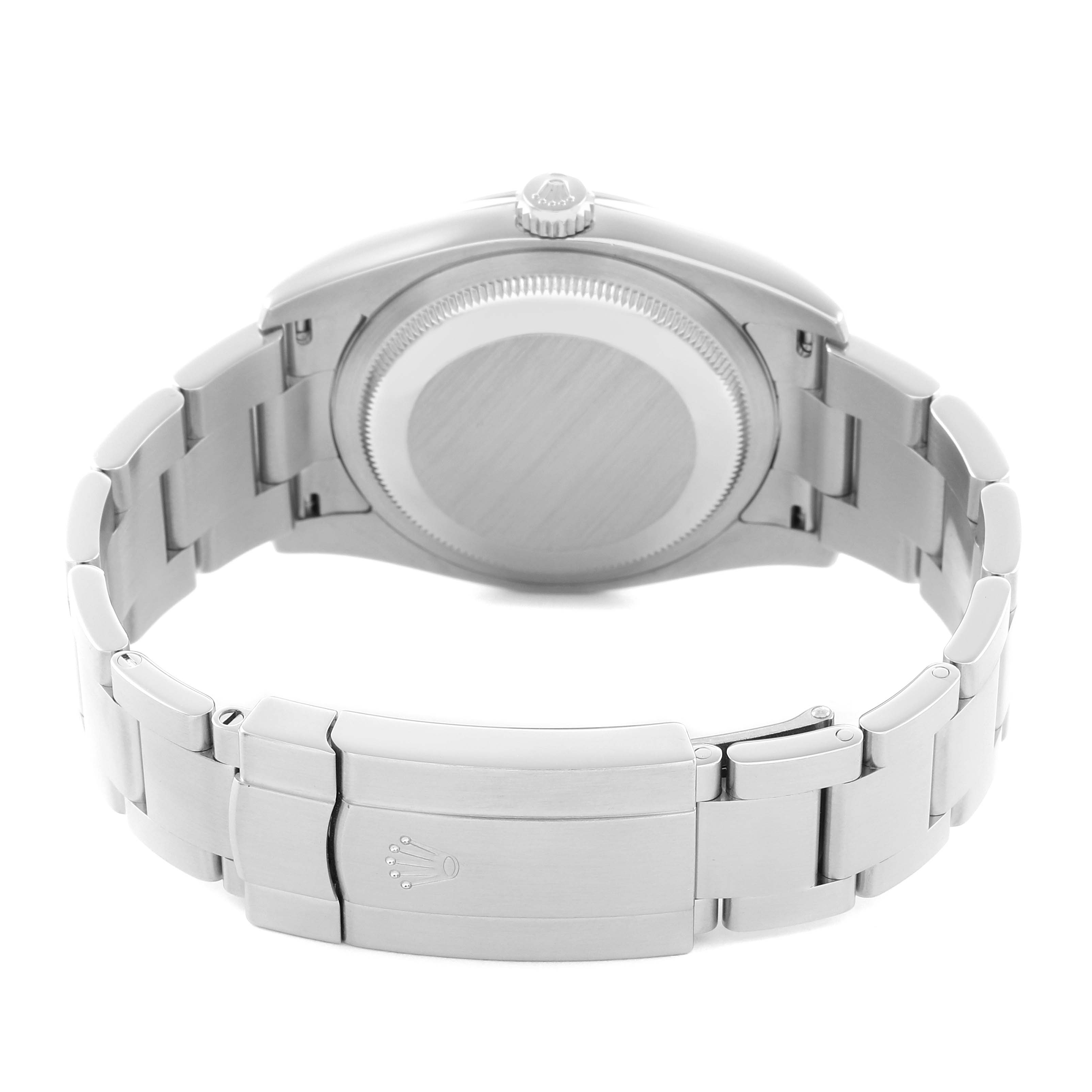 The image shows the back of a Rolex Oyster Perpetual 116034 Men's Stainless Steel Silver Dial watch, highlighting its case, bracelet, and clasp.