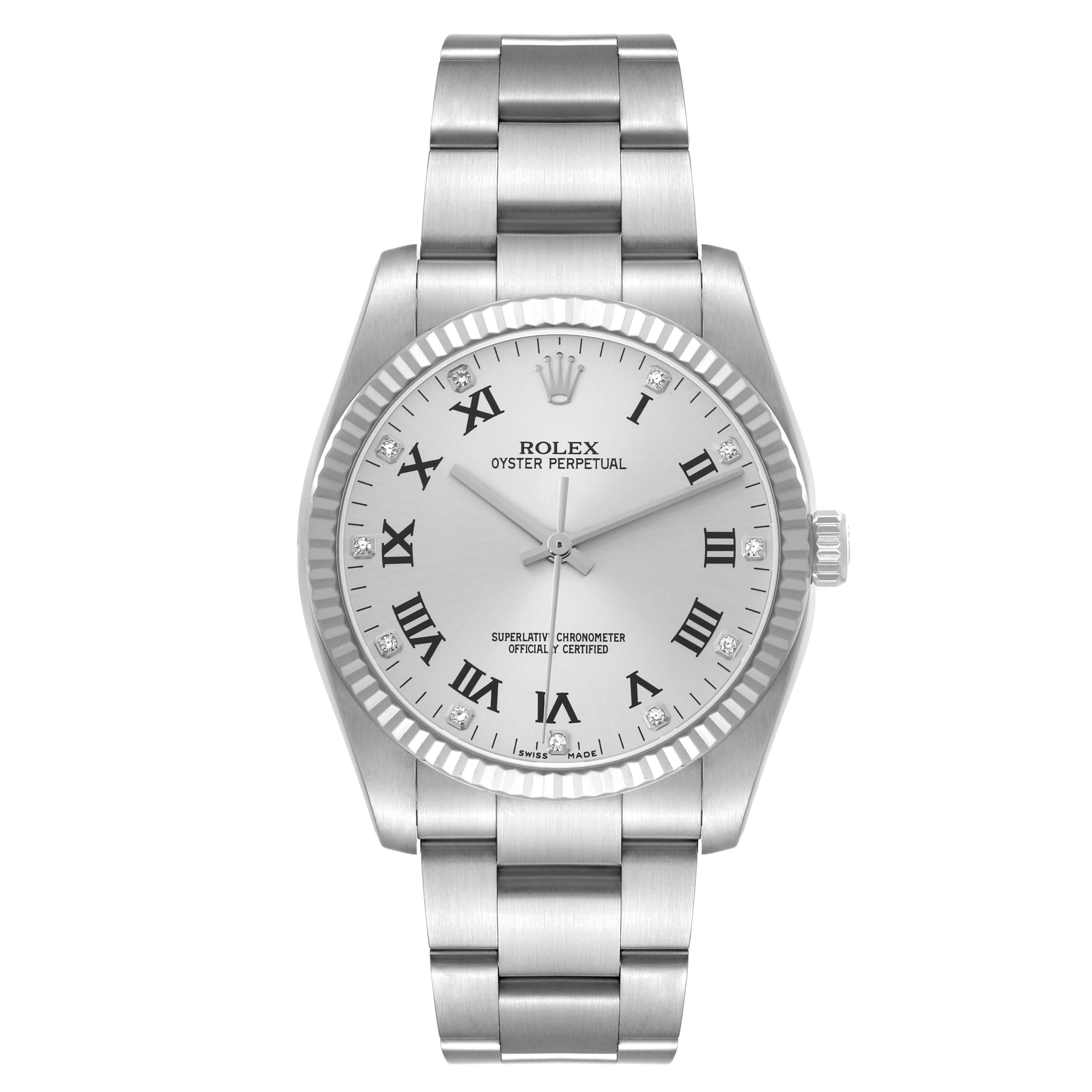 The Rolex Oyster Perpetual 116034 Men's Stainless Steel Silver Dial watch is shown from a top-down angle, displaying the dial, bracelet, and fluted bezel.