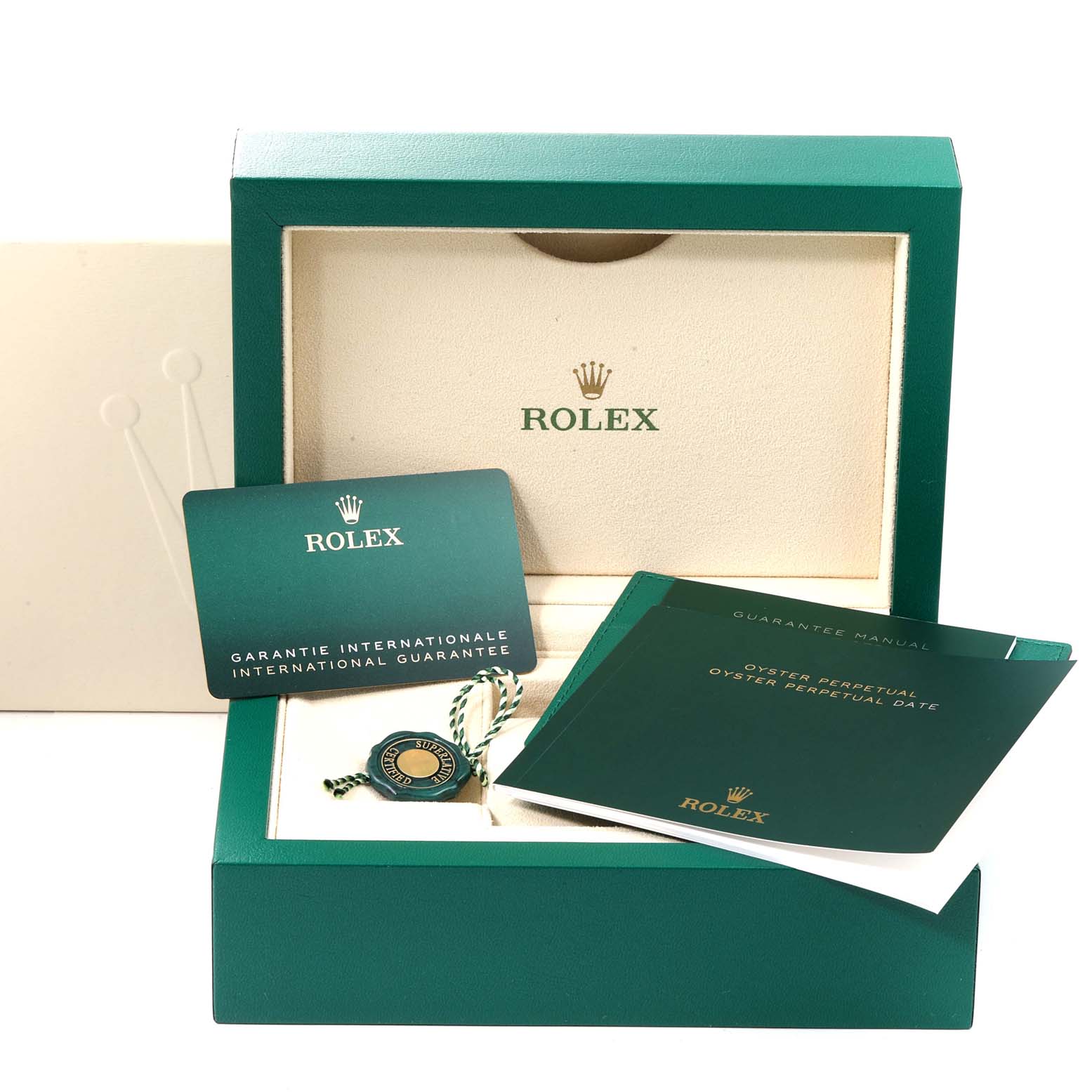 The image shows an open Rolex Oyster Perpetual 124300 Men
s Stainless Steel Blue Dial 124300 Men
s Stainless Steel Blue Dial watch box with manuals, a warranty card, and a hangtag.