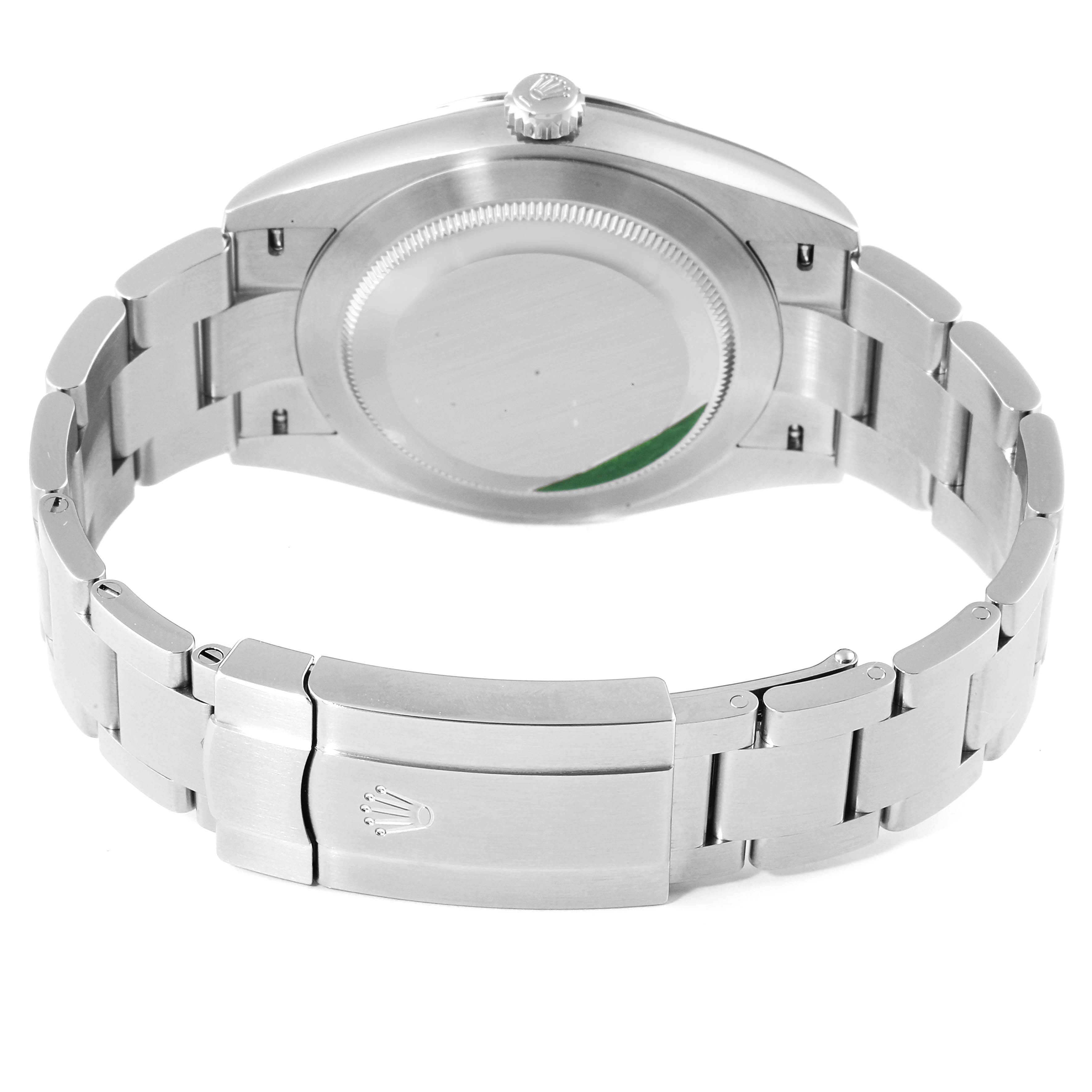 The image shows the back case and bracelet of the Rolex Oyster Perpetual 124300 Men
s Stainless Steel Blue Dial 124300 Men
s Stainless Steel Blue Dial watch from a rear angle.