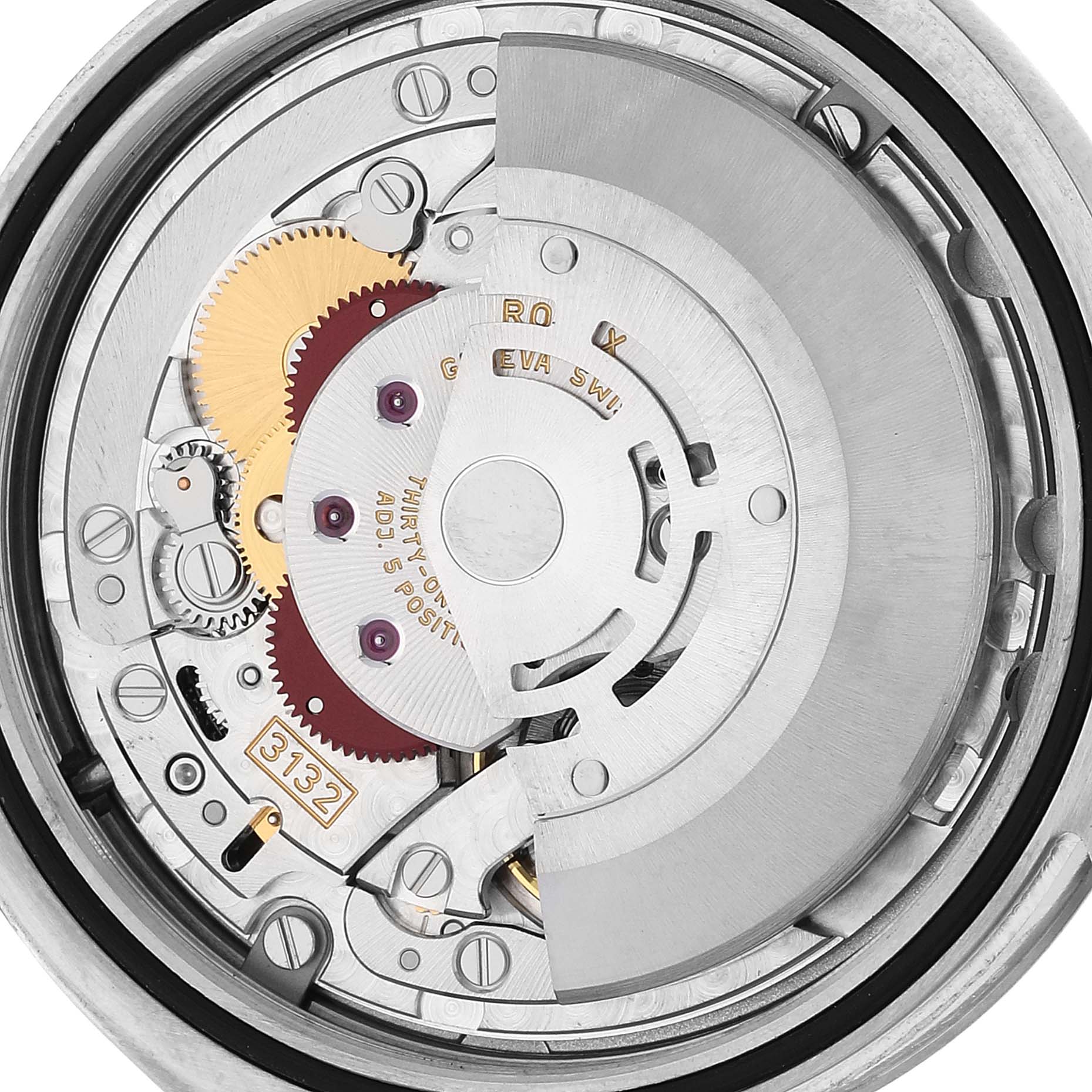 This image shows the inner movement of a Rolex Oyster Perpetual 114300 Men's Stainless Steel Silver Dial 114300 Men's Stainless Steel Silver Dial watch from a top-down angle.