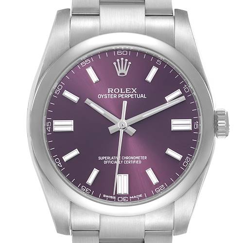 The image shows a frontal view of a Rolex Oyster Perpetual 116000 Men's Stainless Steel Purple Dial watch, highlighting its dial, bezel, and part of the bracelet.