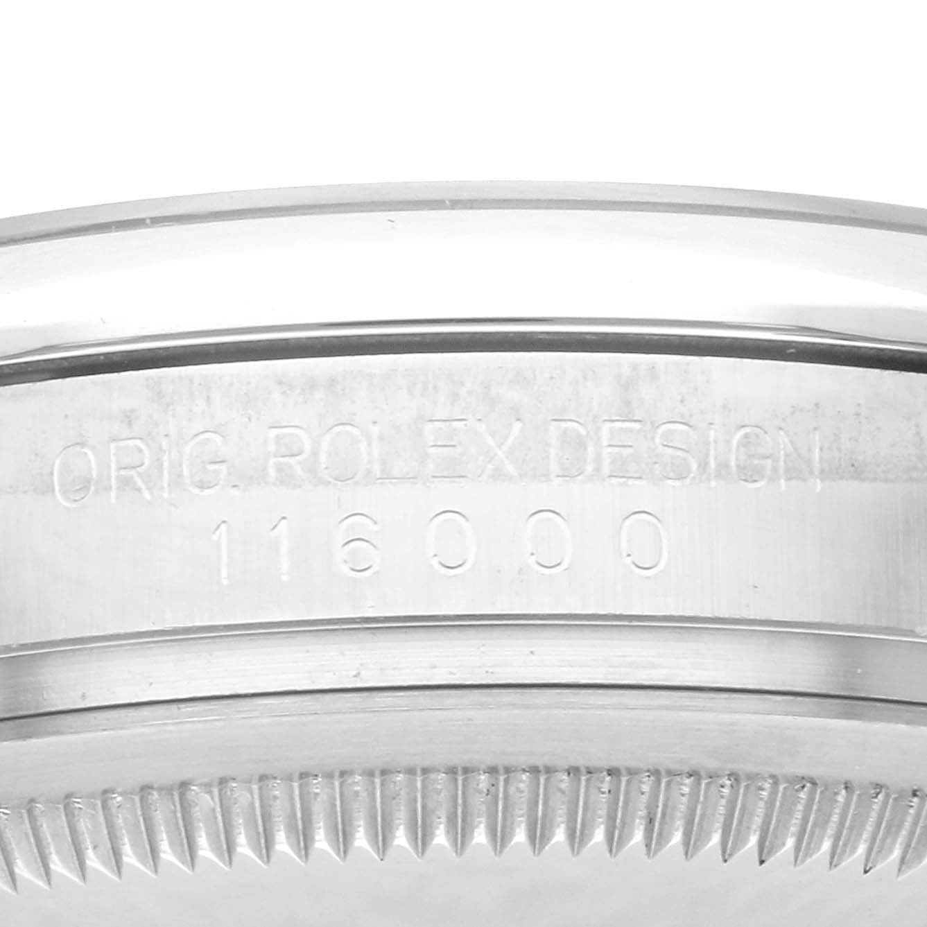 The image shows a close-up view of the case edge of a Rolex Oyster Perpetual 116000 Men's Stainless Steel Purple Dial, highlighting the engraved model number.
