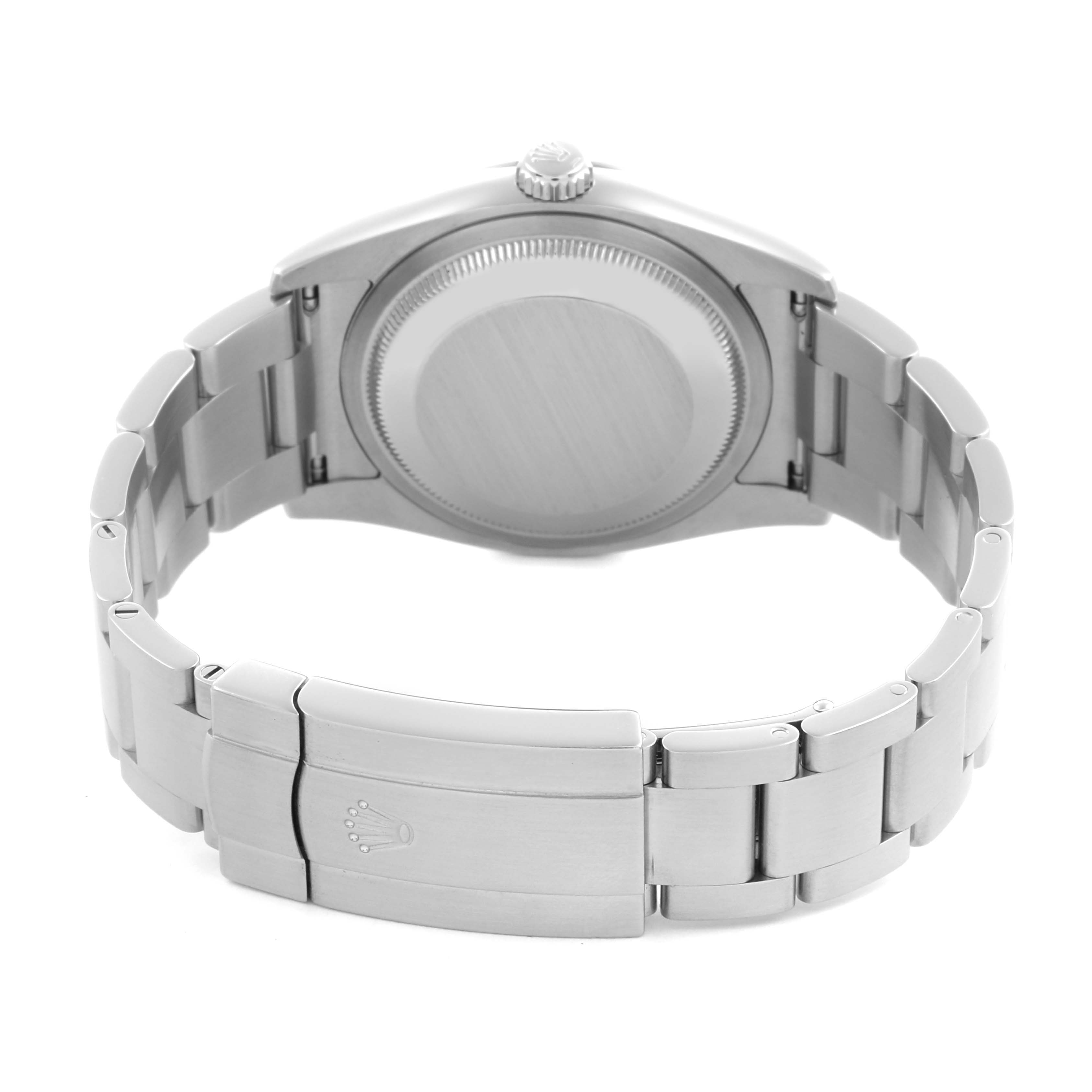 The image shows the back view of a Rolex Oyster Perpetual 116000 Men's Stainless Steel Purple Dial, displaying the case back, crown, and bracelet with the clasp.