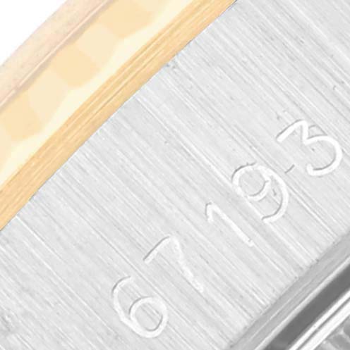 The image shows a close-up of the bracelet clasp with engraved numbers on a Rolex Oyster Perpetual 67193 Women's Steel and Gold (two tone) Champagne Dial 67193 Women's Steel and Gold (two tone) Champagne Dial watch.