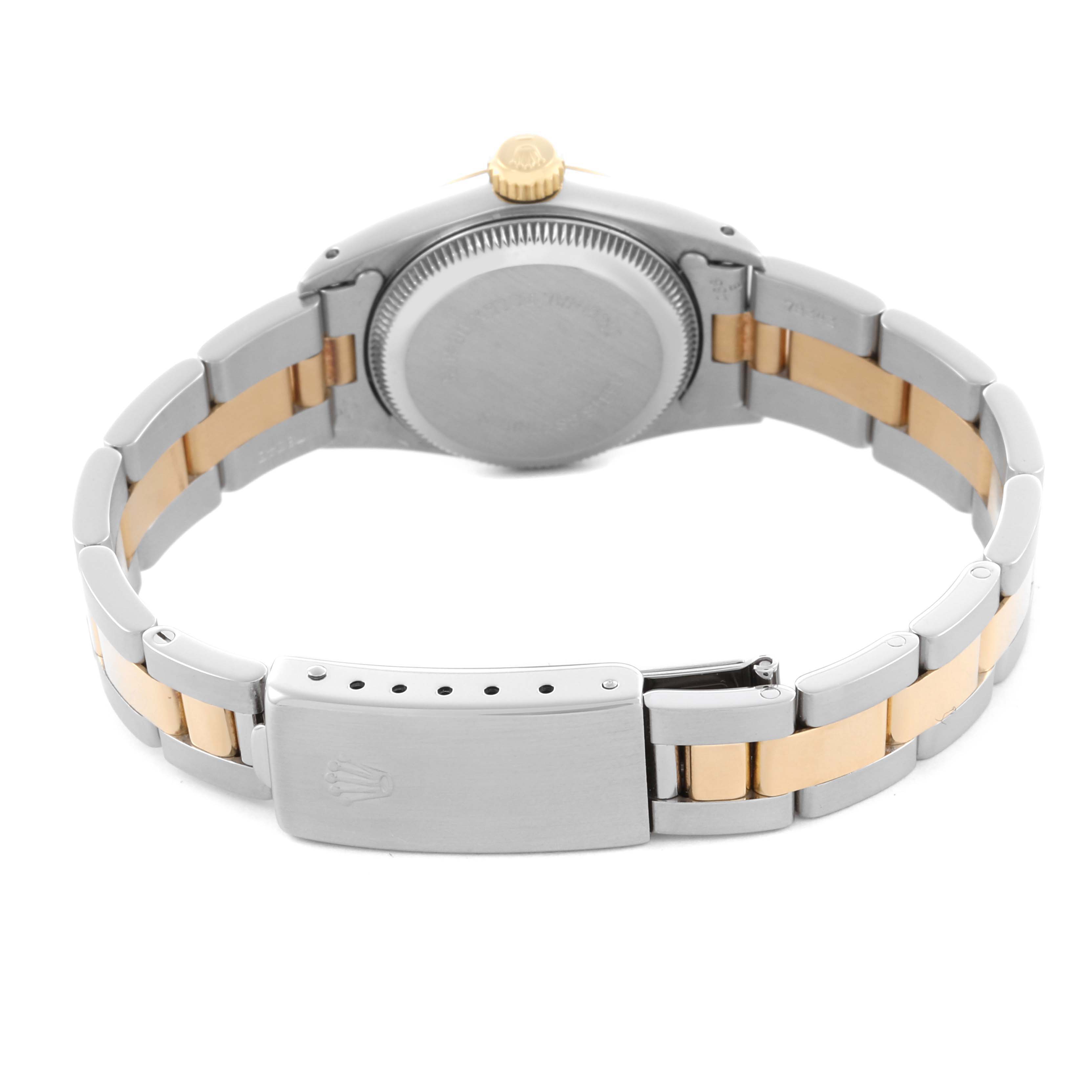 The image shows the back view of a Rolex Oyster Perpetual 67193 Women's Steel and Gold (two tone) Champagne Dial 67193 Women's Steel and Gold (two tone) Champagne Dial, highlighting the bracelet and clasp.