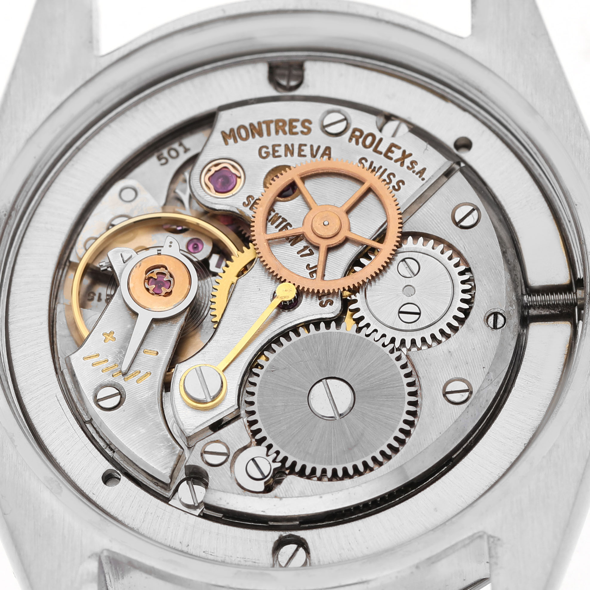 The image shows the intricate movement mechanism of a Rolex Vintage Collection 6694 Men's Stainless Steel Silver Dial watch from a top-down angle.