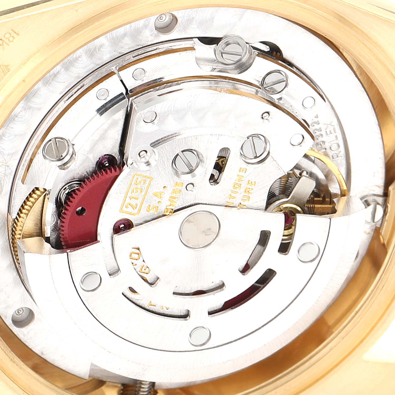 The image shows a close-up of the movement mechanism inside a Rolex President 68248 Women
s Yellow Gold Beige Dial 68248 Women
s Yellow Gold Beige Dial model watch.