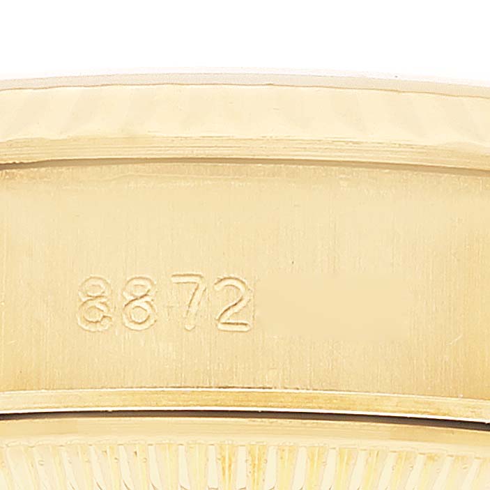This close-up image shows the case back and part of the serial number engraving on a Rolex President 69178 Women
s Yellow Gold Champagne Dial 69178 Women
s Yellow Gold Champagne Dial model watch.