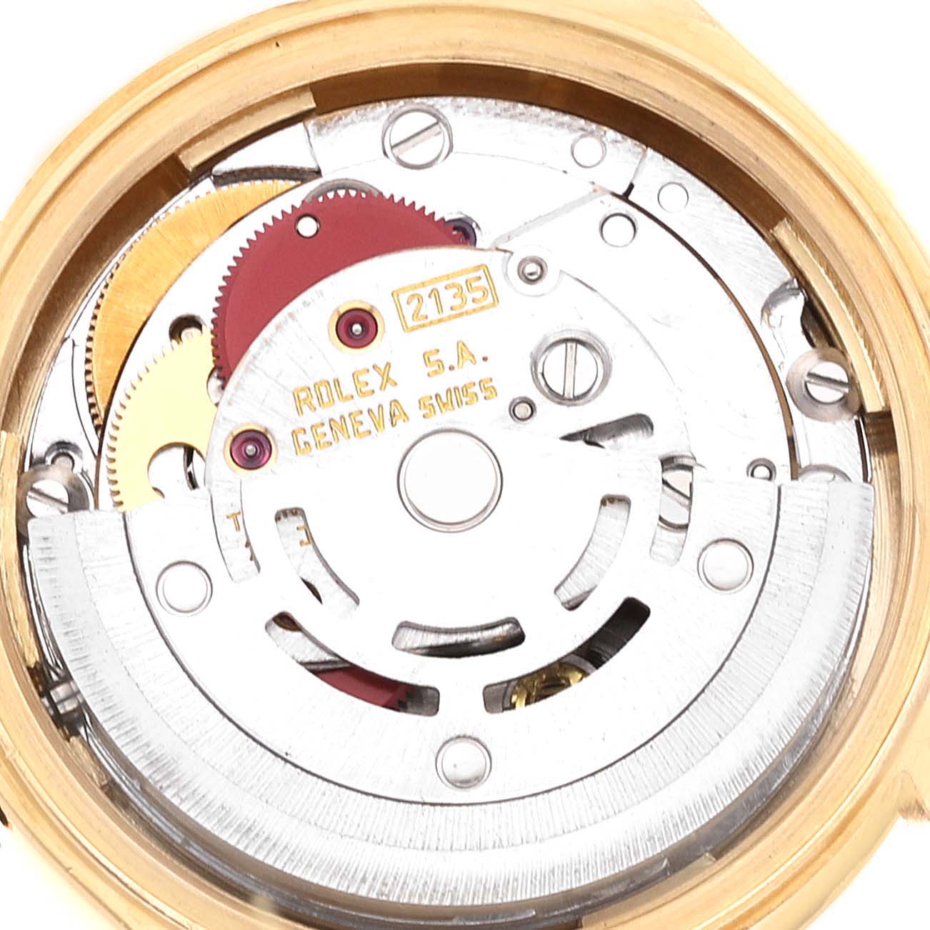 This image shows an internal view of the movement mechanism of a Rolex President 69178 Women
s Yellow Gold Champagne Dial 69178 Women
s Yellow Gold Champagne Dial model watch, displaying its intricate gears and components.