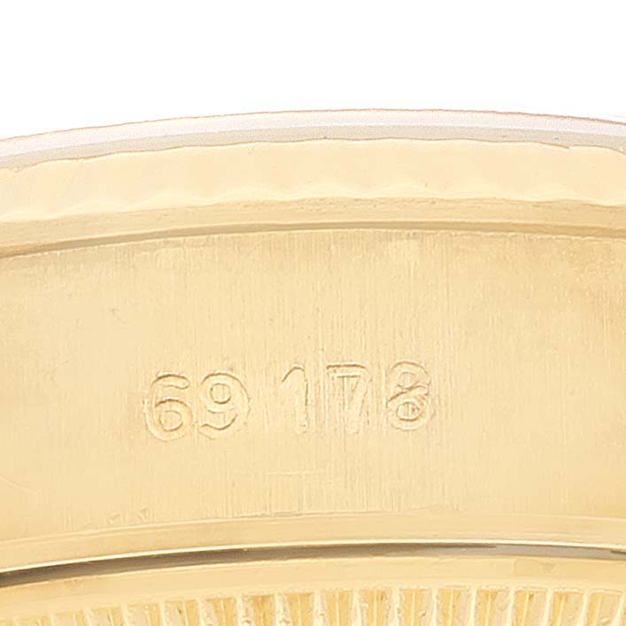 This image shows a close-up of the case back of a Rolex President 69178 Women
s Yellow Gold Champagne Dial 69178 Women
s Yellow Gold Champagne Dial model watch, displaying the engraved model number "69178."