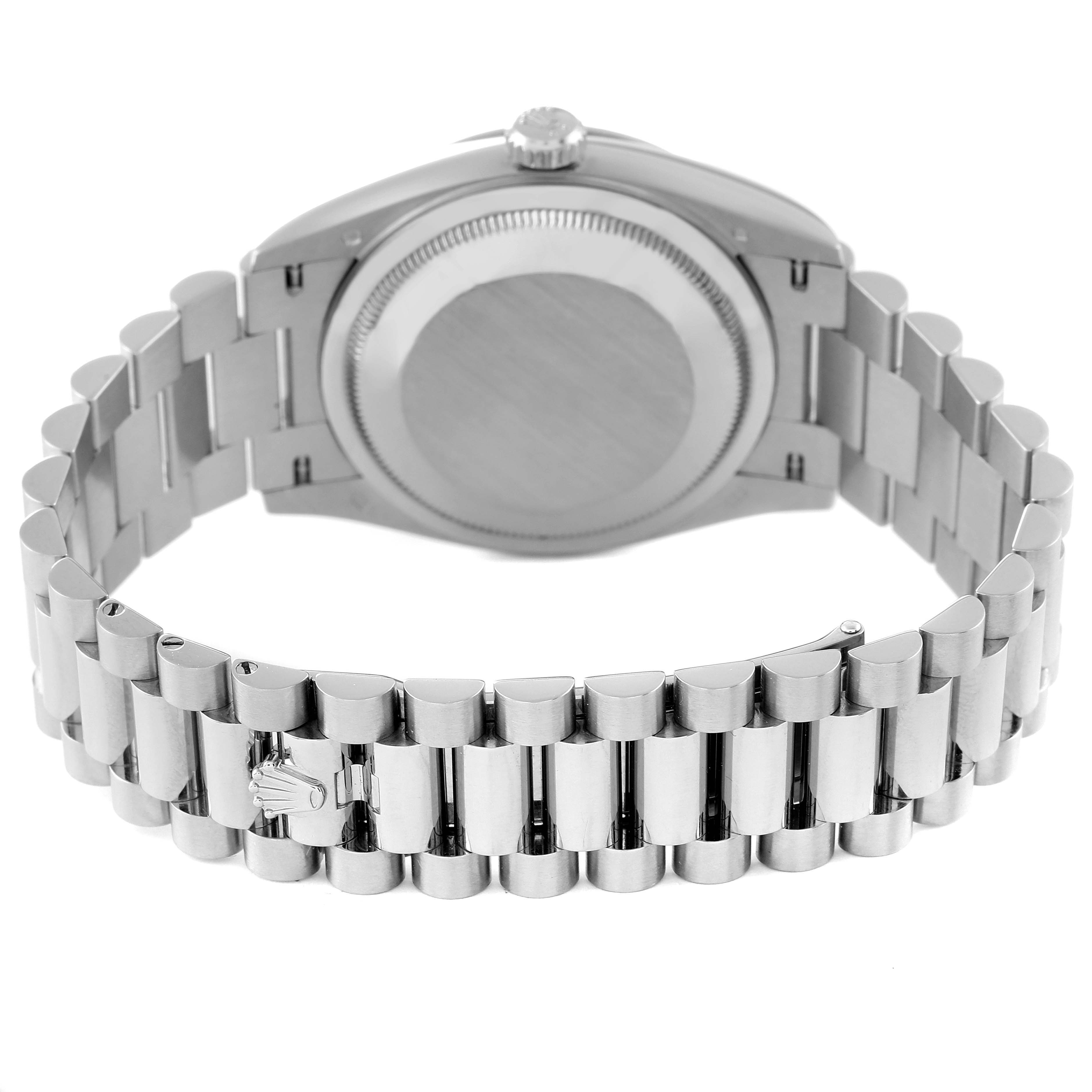 This image shows the back case and bracelet of a Rolex President 128239 Men's White Gold Pink Dial 128239 Men's White Gold Pink Dial model watch.