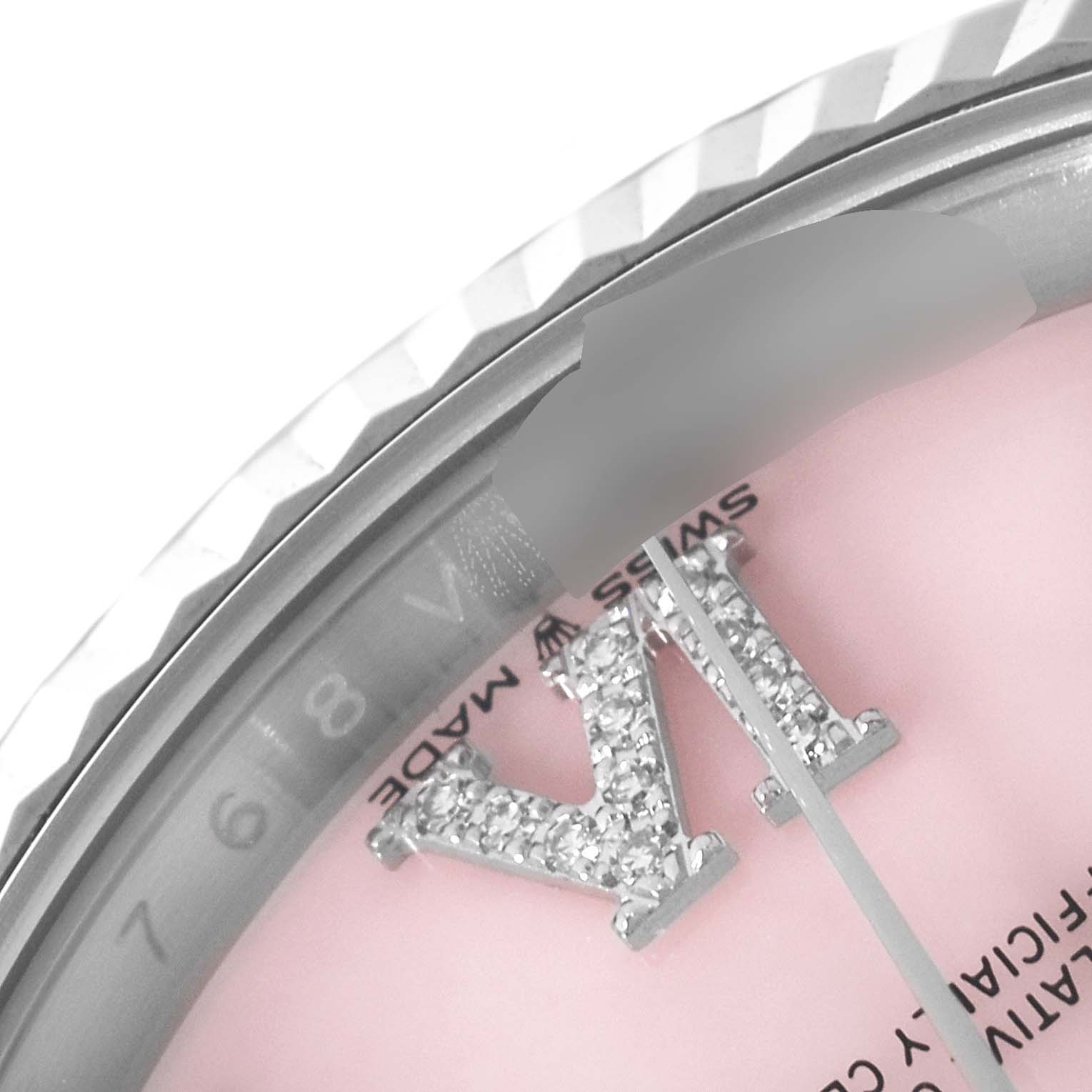 This is a close-up view of the Rolex President 128239 Men's White Gold Pink Dial 128239 Men's White Gold Pink Dial model showing the bezel, diamond-studded markers, and part of the dial.
