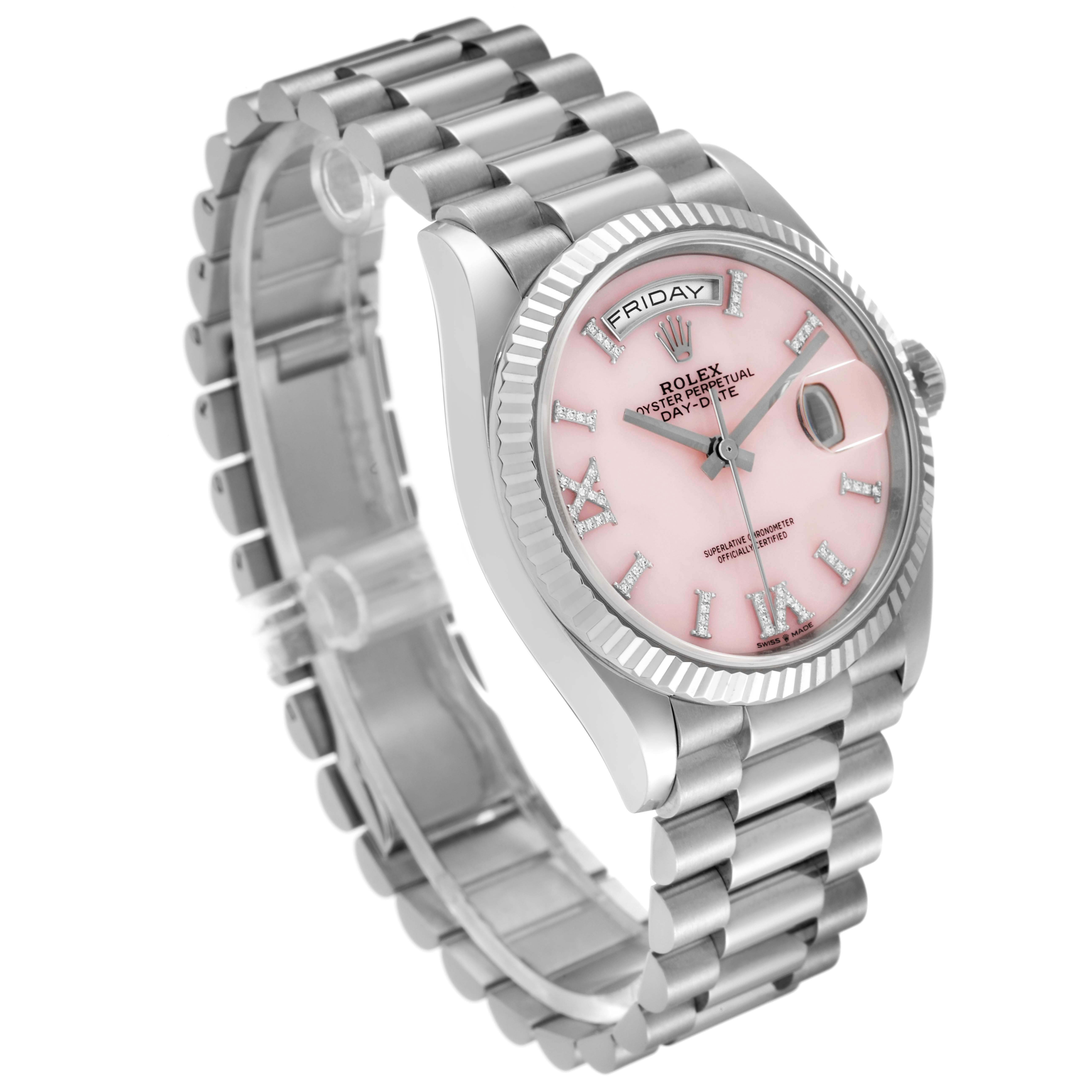 The Rolex President 128239 Men's White Gold Pink Dial 128239 Men's White Gold Pink Dial model is shown at an angled top view, displaying its pink dial, fluted bezel, and President bracelet.