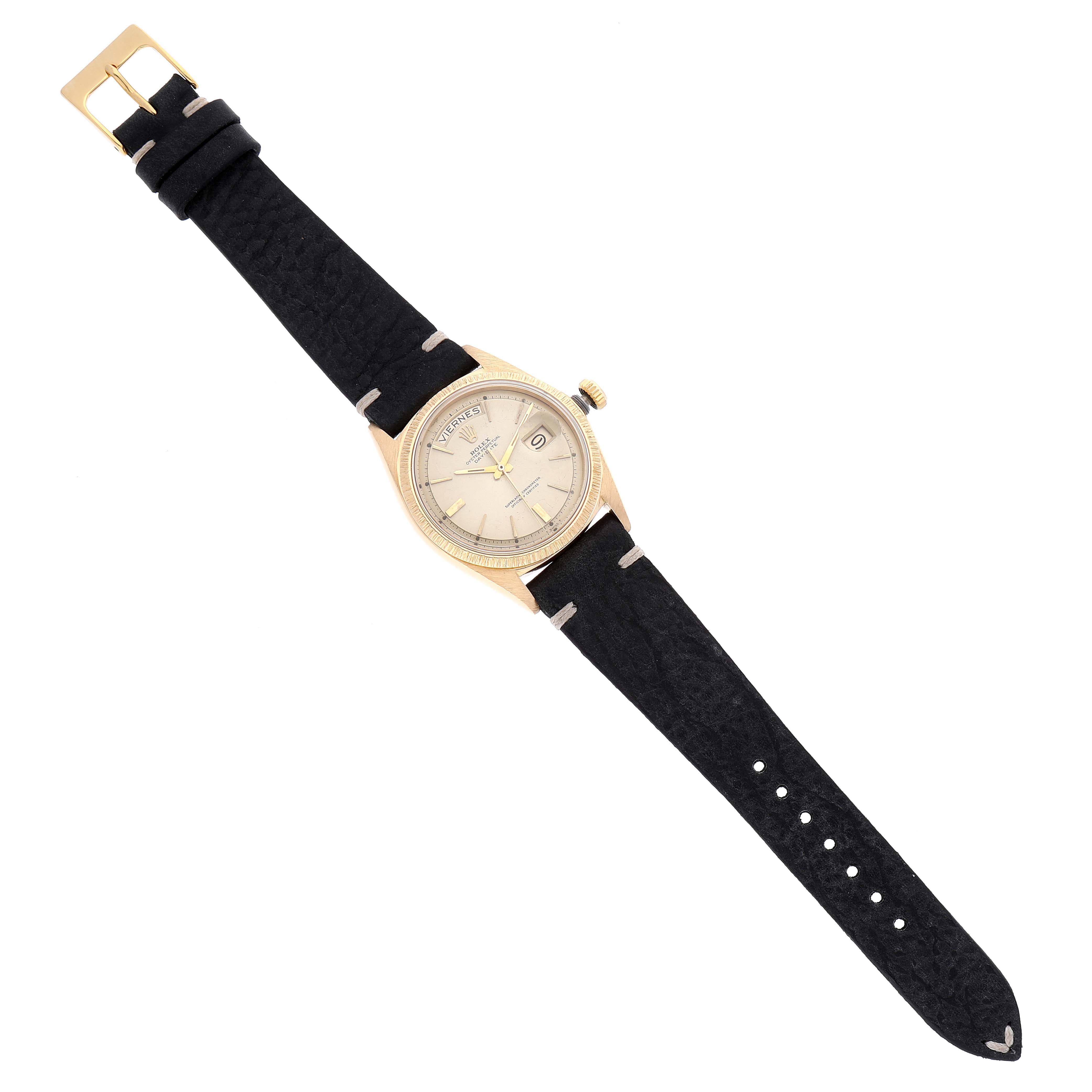 The image shows a Rolex Vintage Collection 1807 Men's Yellow Gold Champagne Dial 1807 Men's Yellow Gold Champagne Dial watch with a golden case and black leather strap, viewed from a top-down angle.