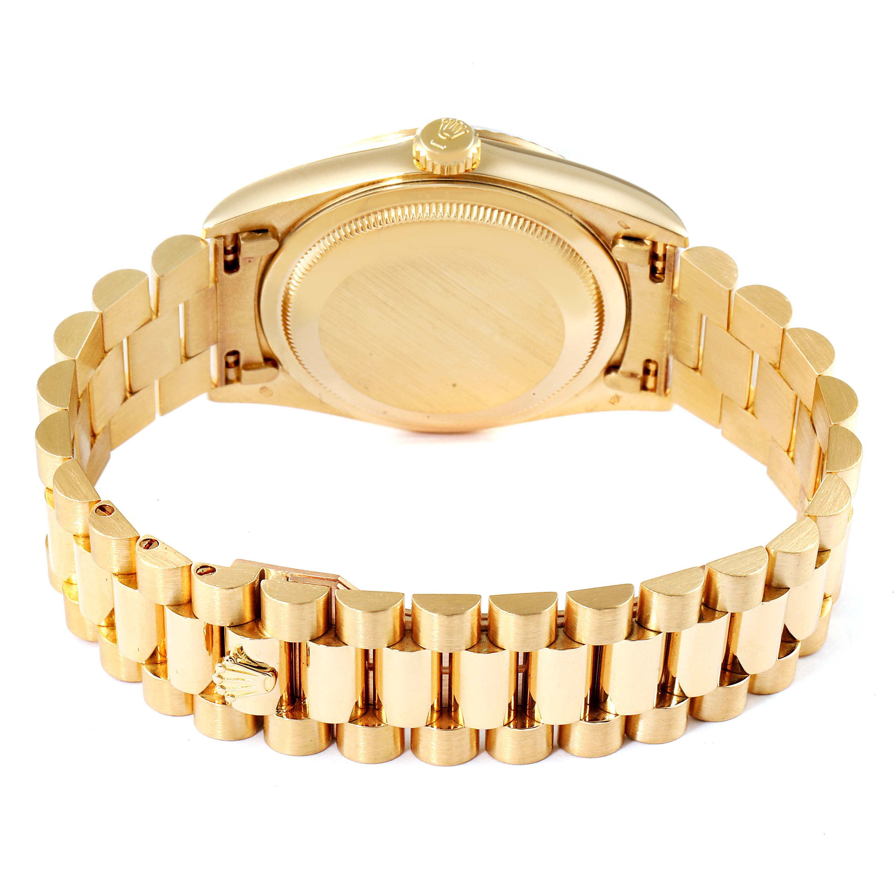 This image shows the back and bracelet of a Rolex President 18238 Men's Yellow Gold Champagne Dial 18238 Men's Yellow Gold Champagne Dial model watch from an overhead angle.