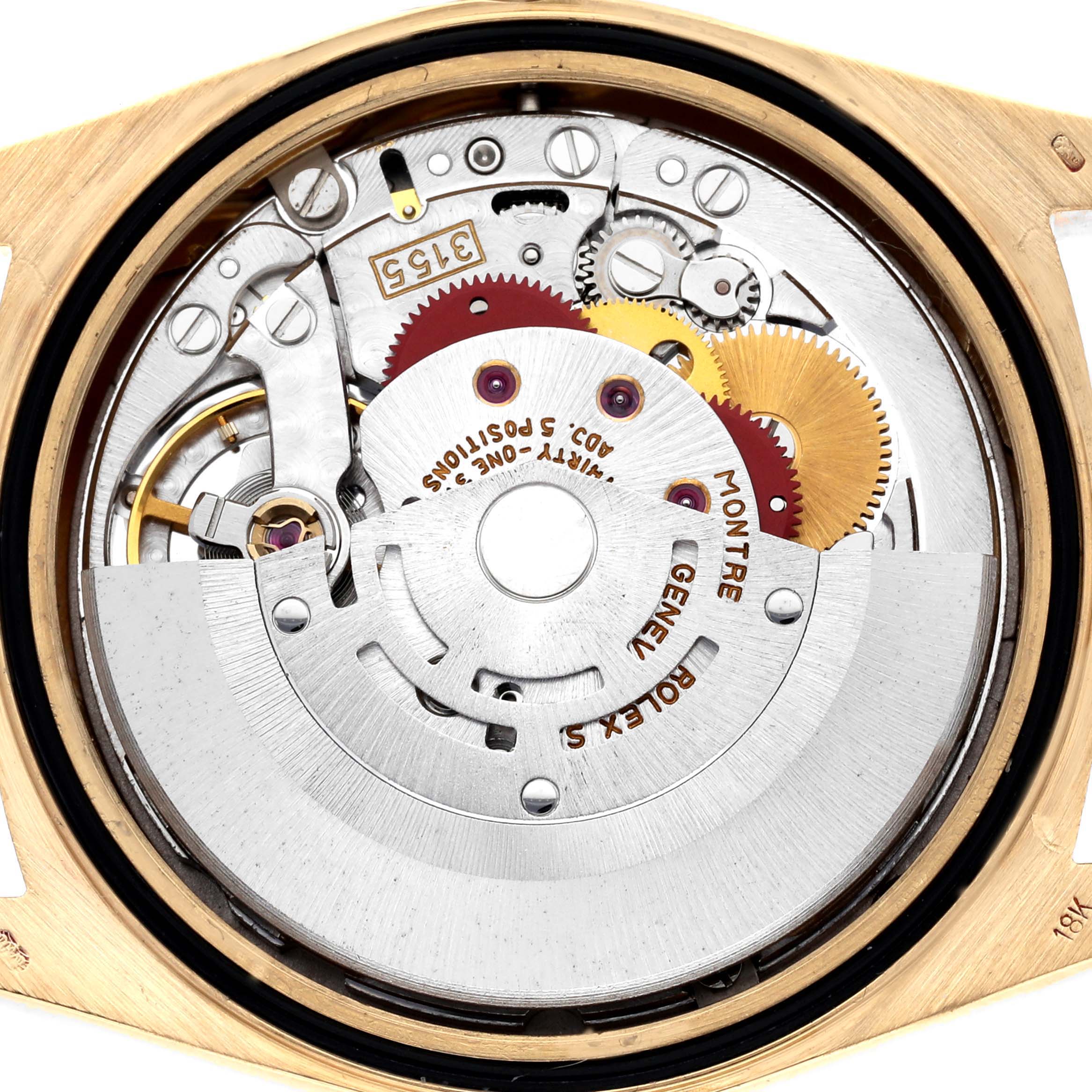 The image shows the internal mechanism of a Rolex President 18238 Men's Yellow Gold Silver Dial 18238 Men's Yellow Gold Silver Dial model watch viewed from the back, revealing its gears and rotor.