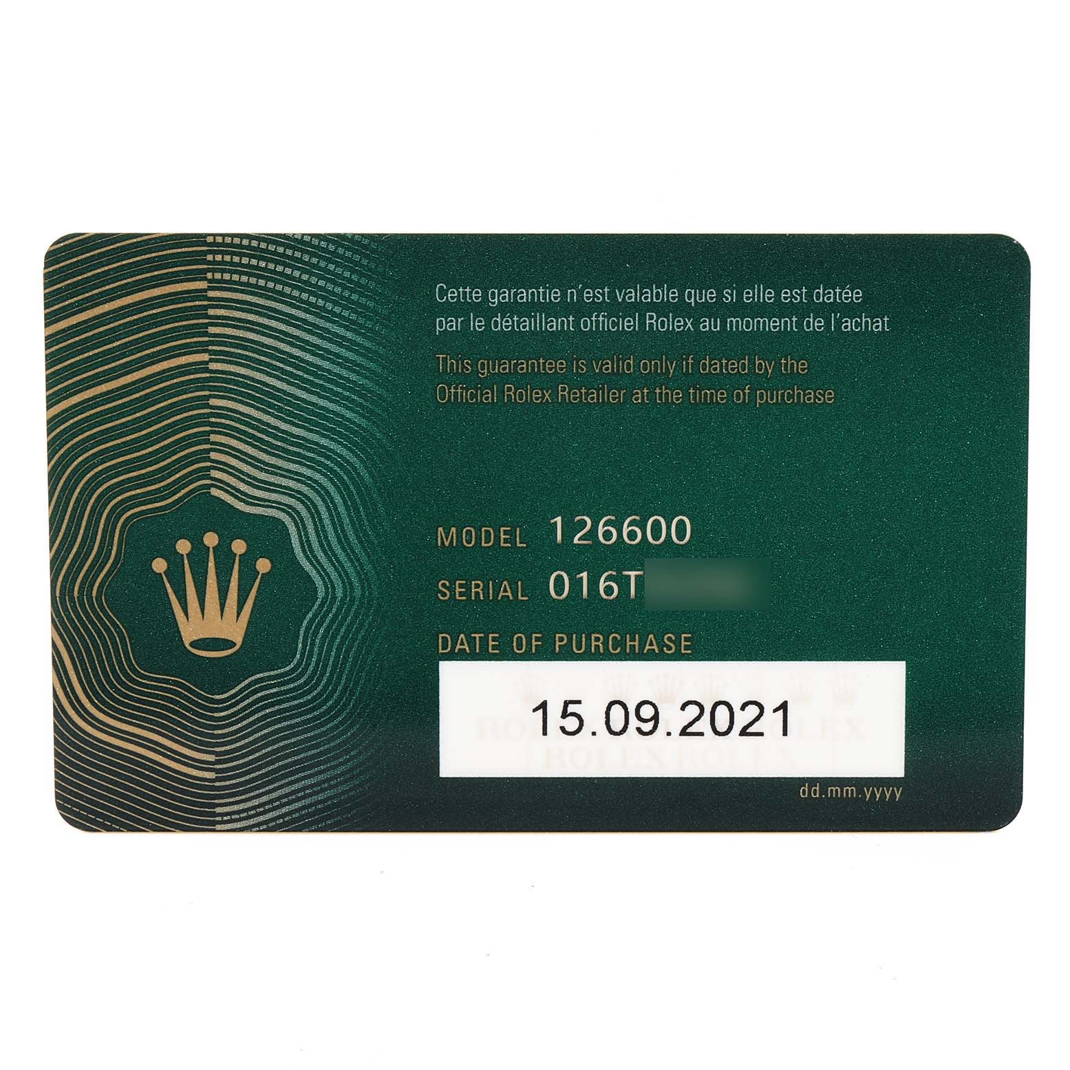 The image shows a guarantee card for a Rolex Sea-Dweller 126600 Men
s Stainless Steel Black Dial 126600 Men
s Stainless Steel Black Dial model 126600.