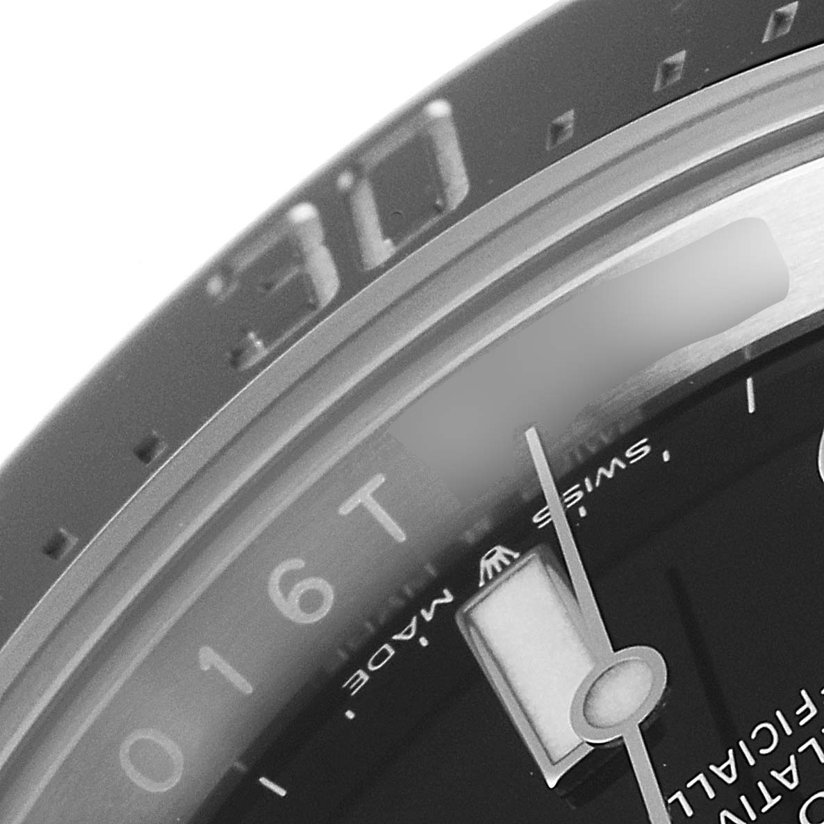 This image shows a close-up of the bezel and part of the dial of the Rolex Sea-Dweller 126600 Men
s Stainless Steel Black Dial 126600 Men
s Stainless Steel Black Dial watch.