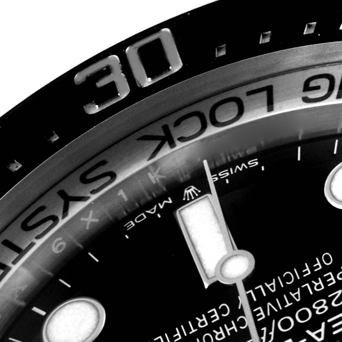 This close-up image of the Rolex Sea-Dweller 126660 Men
s Stainless Steel Blue Dial 126660 Men
s Stainless Steel Blue Dial watch shows the bezel, partial dial, and part of the hour hand.