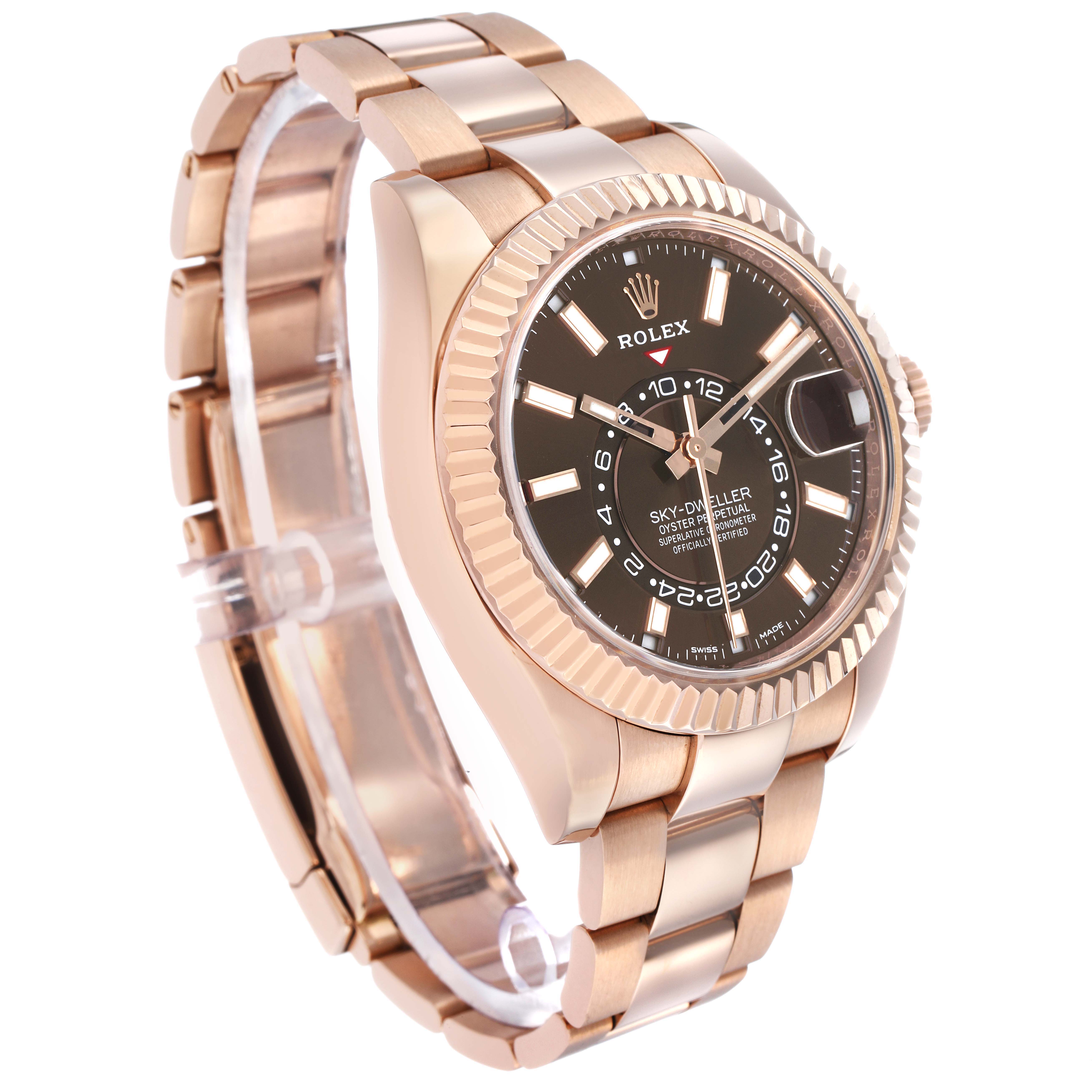 The Rolex Sky-Dweller 326935 Men's Rose Gold Brown Dial watch is shown at a slight left angle, displaying the face, bezel, and bracelet.