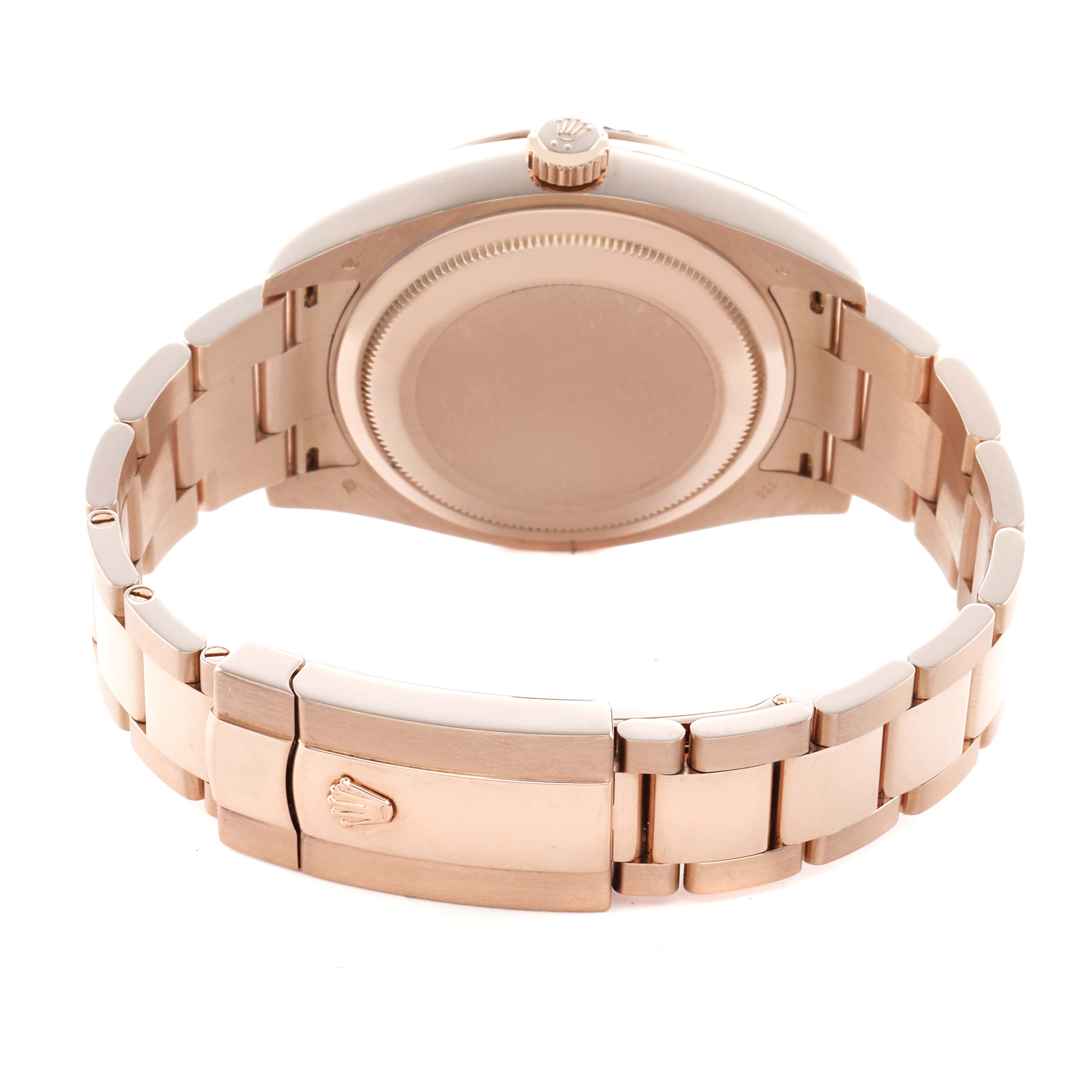 The image shows the back and bracelet of a Rolex Sky-Dweller 326935 Men's Rose Gold Brown Dial, highlighting the clasp and caseback from a slightly elevated angle.