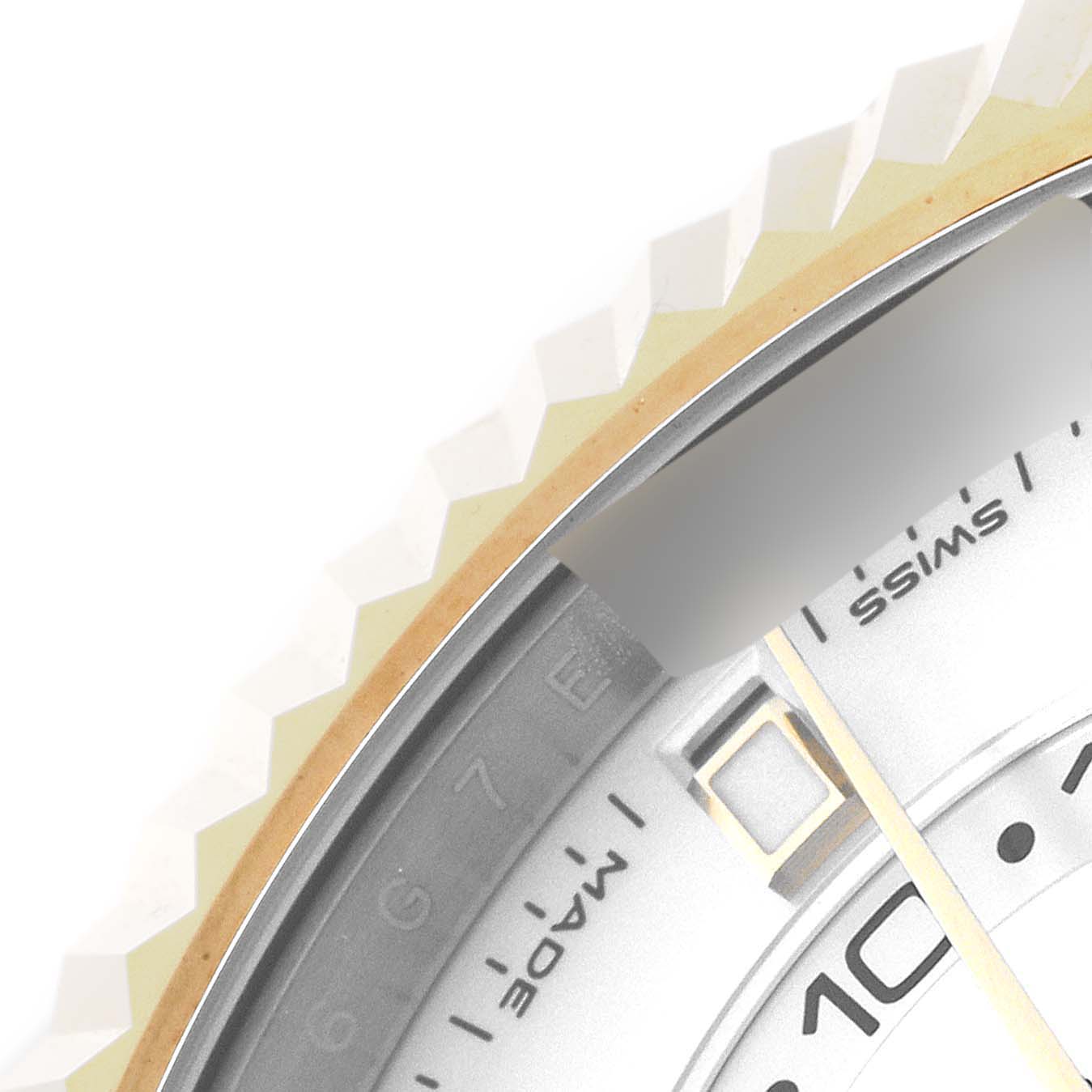 Close-up of the Sky-Dweller model by Rolex, showing part of the bezel, dial, and chapter ring.