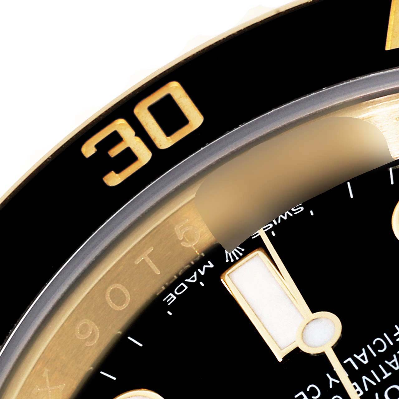 The image shows a close-up of the Rolex Submariner 126618 Men
s Yellow Gold Black Dial 126618 Men
s Yellow Gold Black Dial
s bezel and part of the watch dial with the "30" minute marker visible.