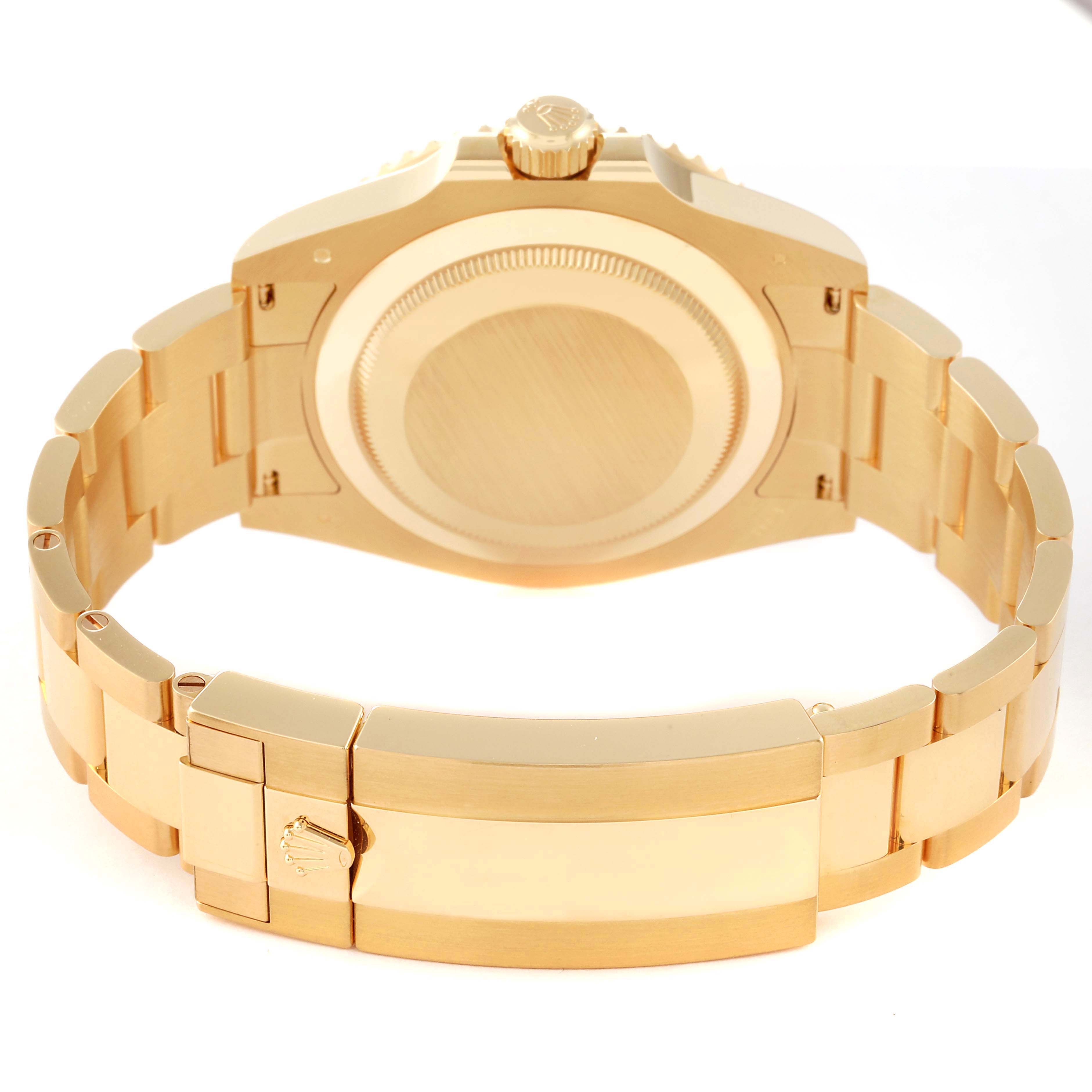 The image shows the back of the Rolex Submariner 126618 Men
s Yellow Gold Black Dial 126618 Men
s Yellow Gold Black Dial watch, highlighting its bracelet, clasp, case back, and crown.