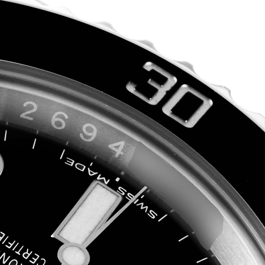 The image shows a close-up of the bezel and part of the dial of the Rolex Submariner 114060 Men
s Stainless Steel Black Dial 114060 Men
s Stainless Steel Black Dial watch, highlighting the "30" mark.