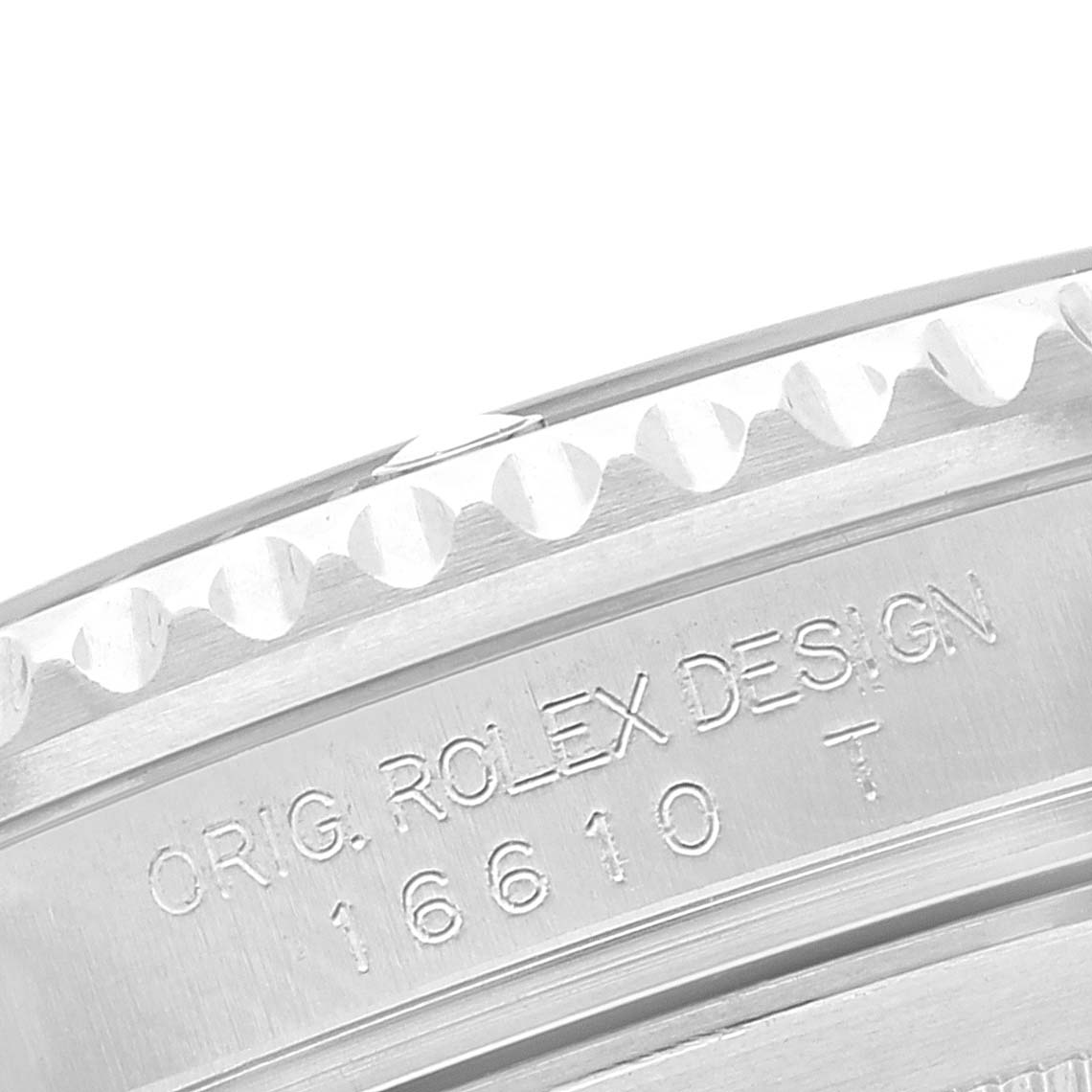 This image shows a close-up of the engraved inner bezel and case side of a Rolex Submariner 16610 Men
s Stainless Steel Black Dial 16610 Men
s Stainless Steel Black Dial watch, including model number 16610.