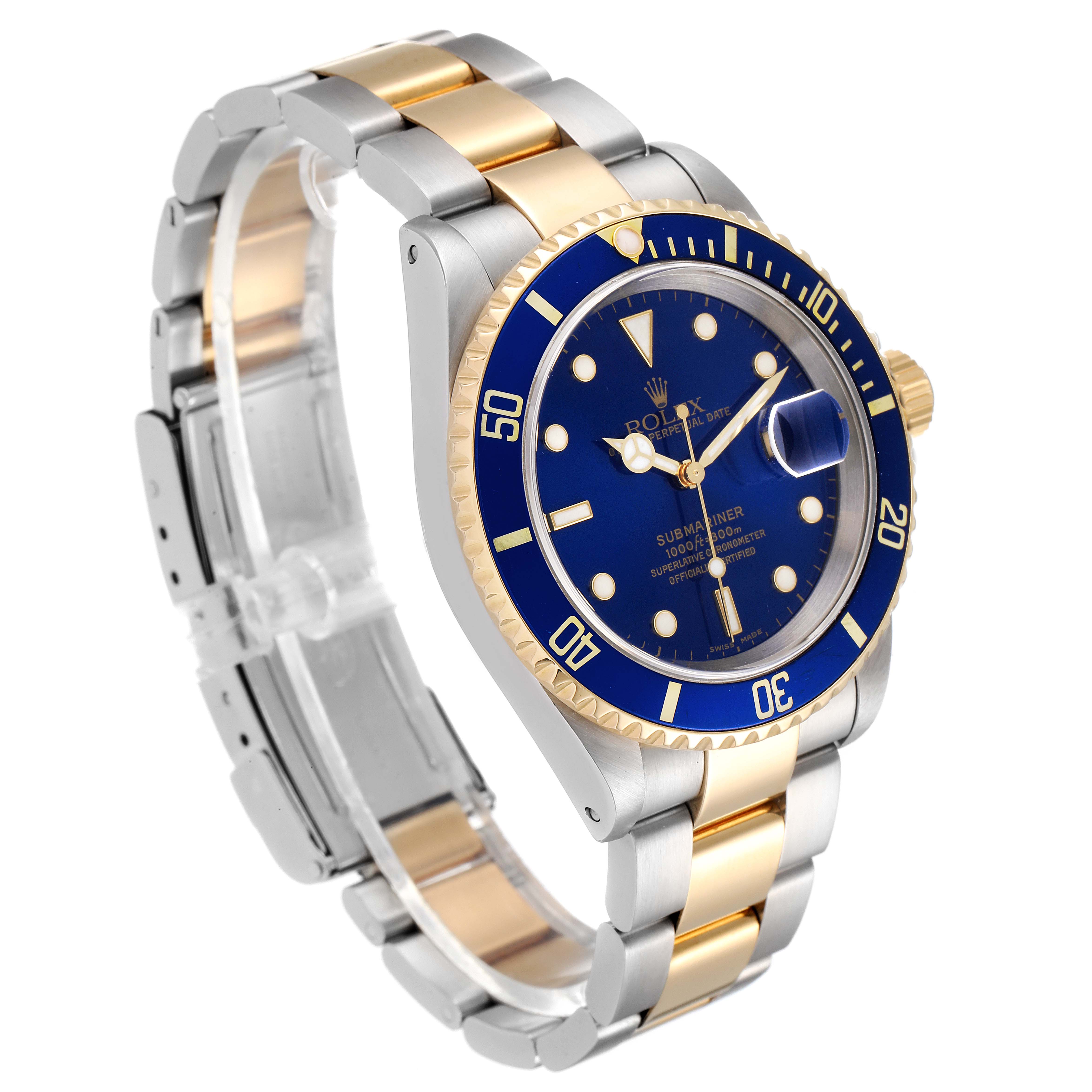 The Rolex Submariner 16613 Men
s Steel and Gold (two tone) Blue Dial 16613 Men
s Steel and Gold (two tone) Blue Dial watch is shown at a three-quarter angle, highlighting its blue dial, gold bezel, and two-tone bracelet.