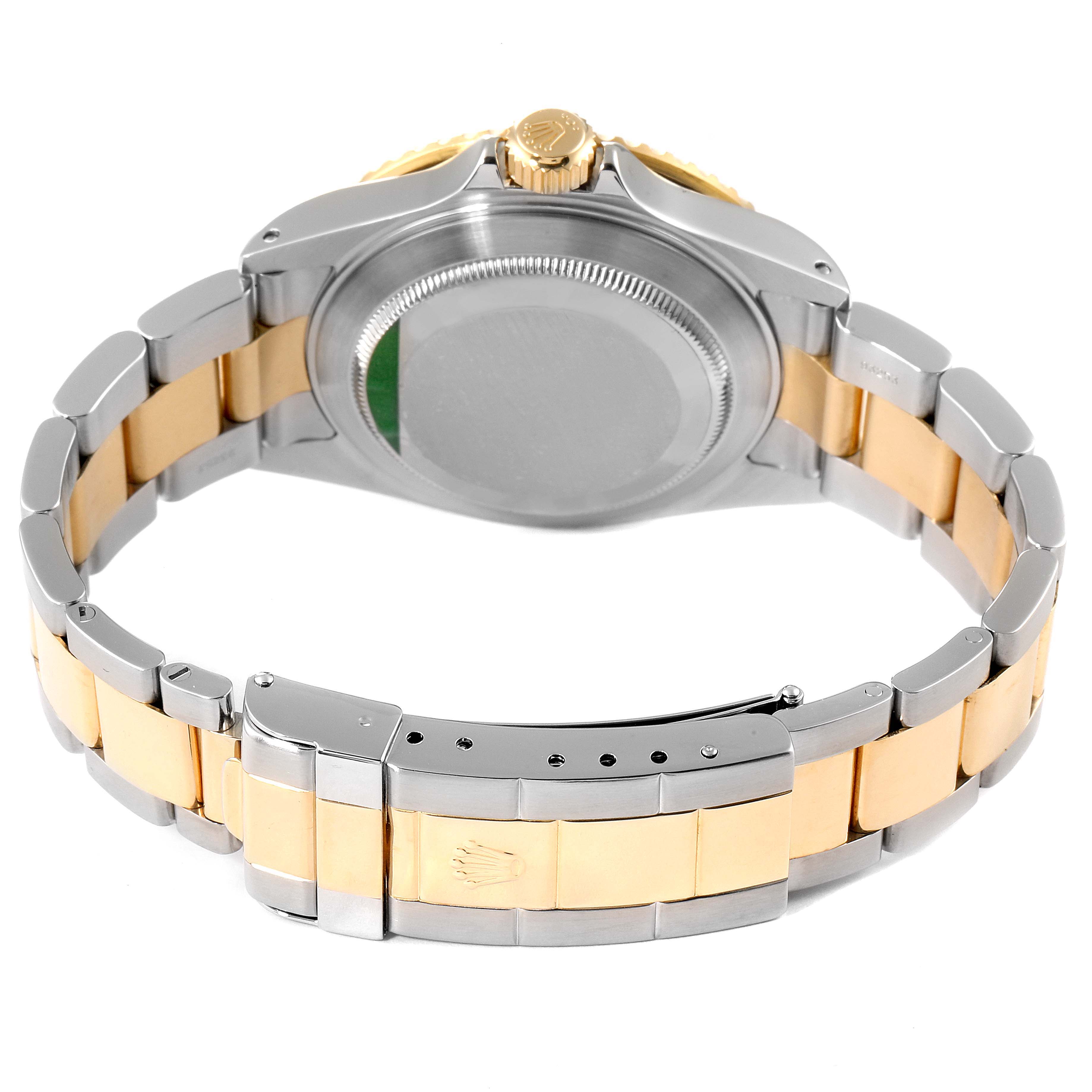 This image shows the back case and bracelet of a Rolex Submariner 16613 Men
s Steel and Gold (two tone) Blue Dial 16613 Men
s Steel and Gold (two tone) Blue Dial watch, viewed from the rear.