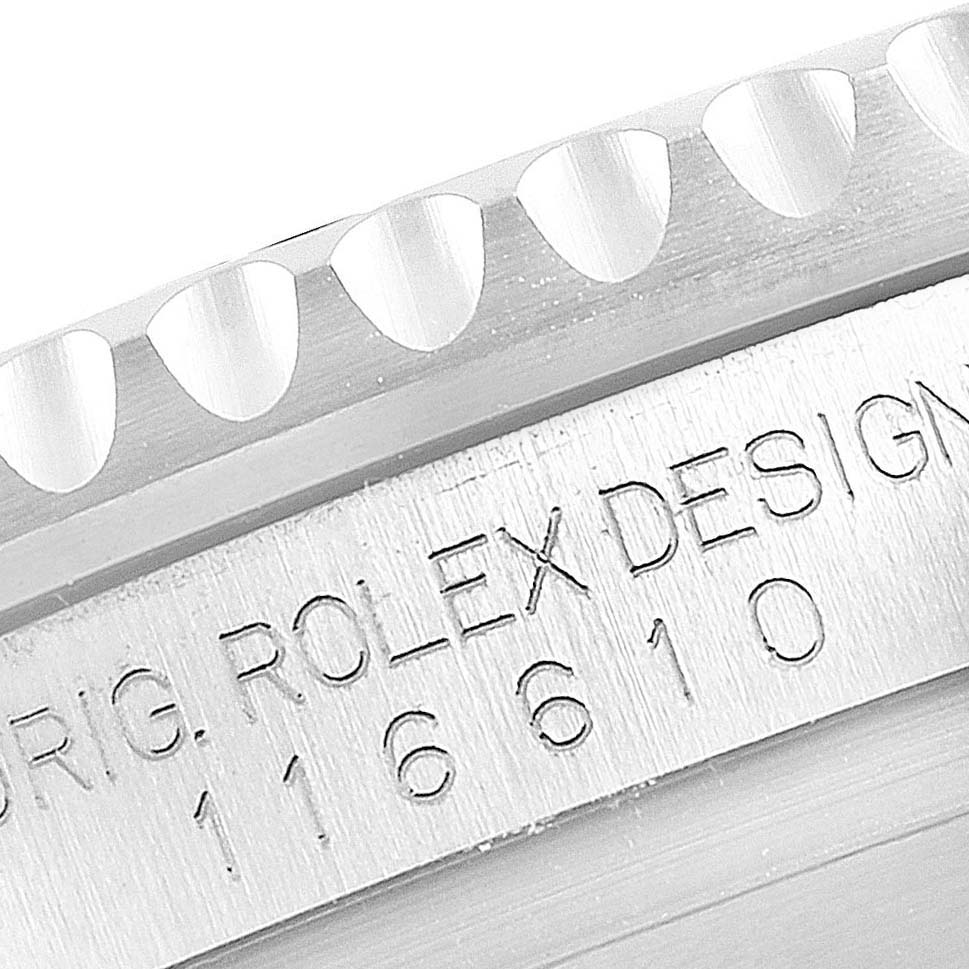 This close-up angle shows the engraved model number and part of the bezel of the Rolex Submariner 116610LV Men
s Stainless Steel Green Dial 116610LV Men
s Stainless Steel Green Dial watch.