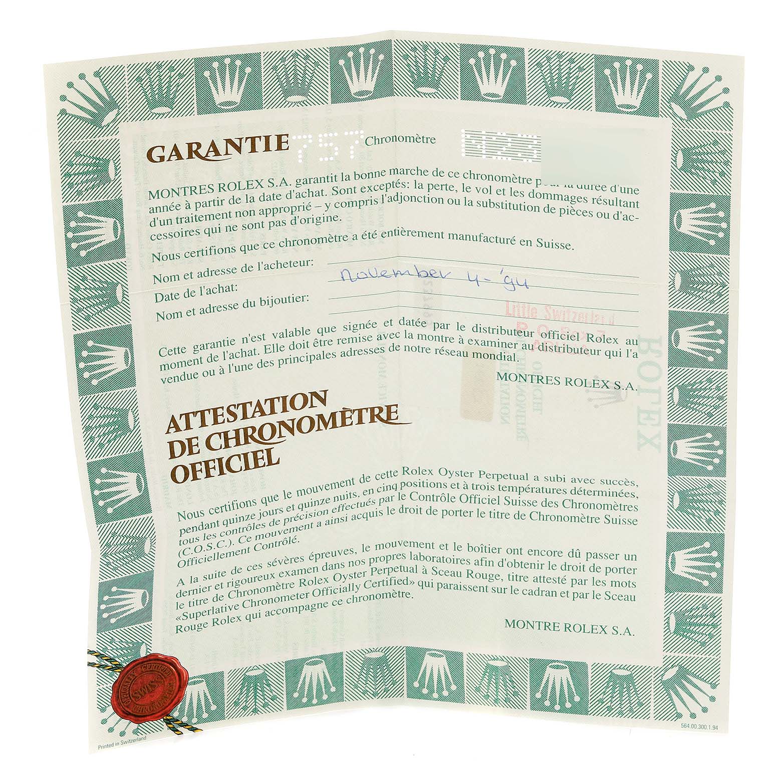 The image shows a warranty certificate for a Rolex Submariner 16613 Men's Steel and Gold (two tone) Blue Dial watch, featuring text and decorative borders with the Rolex logo.