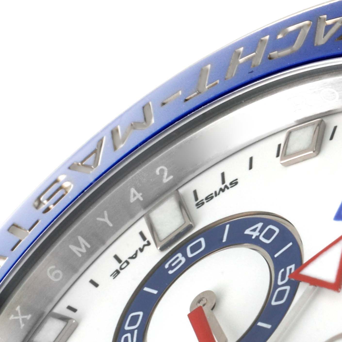 The image shows a close-up of the Rolex Yacht-Master 116680 Men's Stainless Steel White Dial 116680 Men's Stainless Steel White Dial watch face, focusing on the bezel and part of the dial.